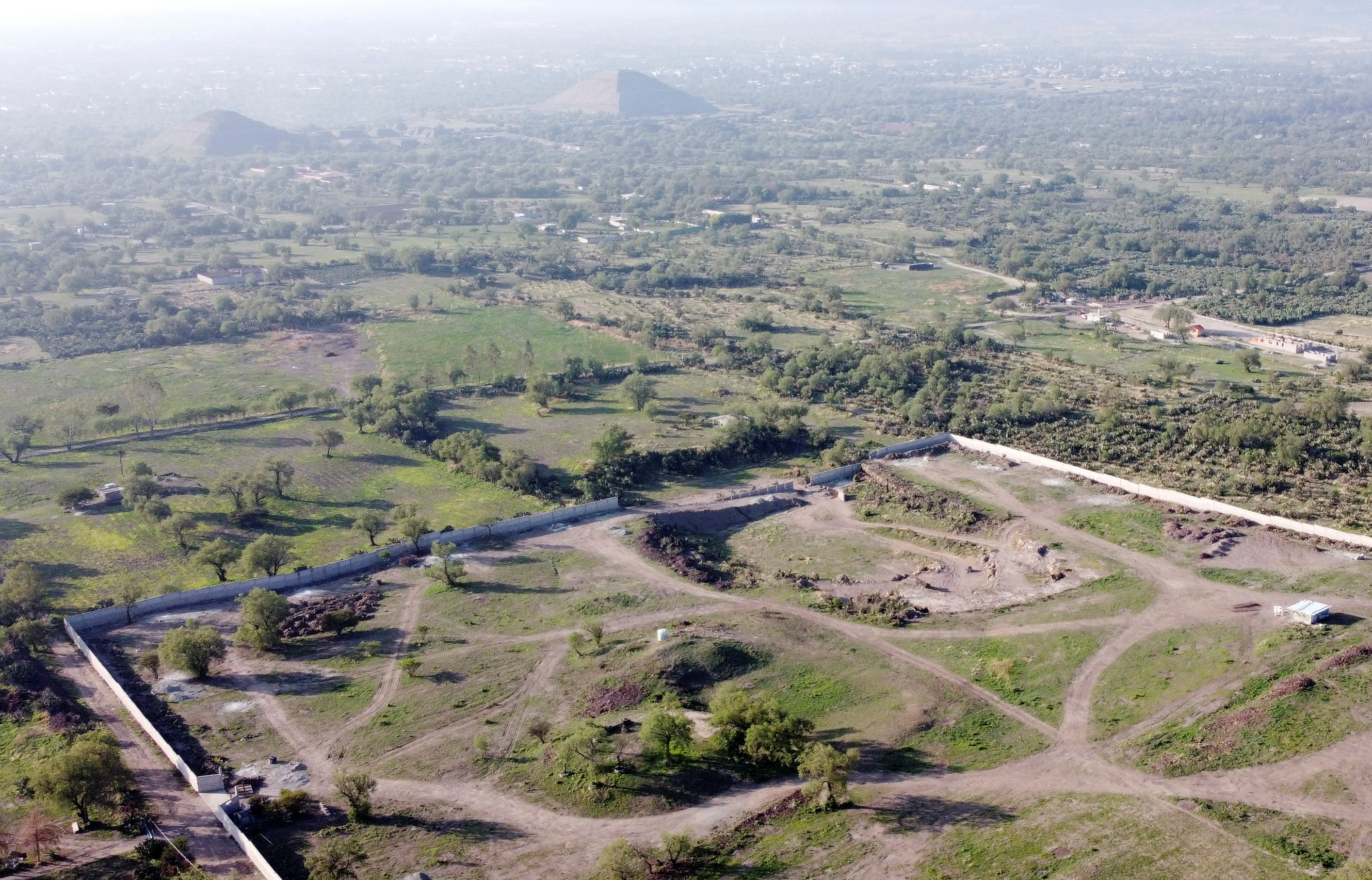 A construction site is seen near the pre-Hispanic ruins of Teotihuacan in Oztoyahualco