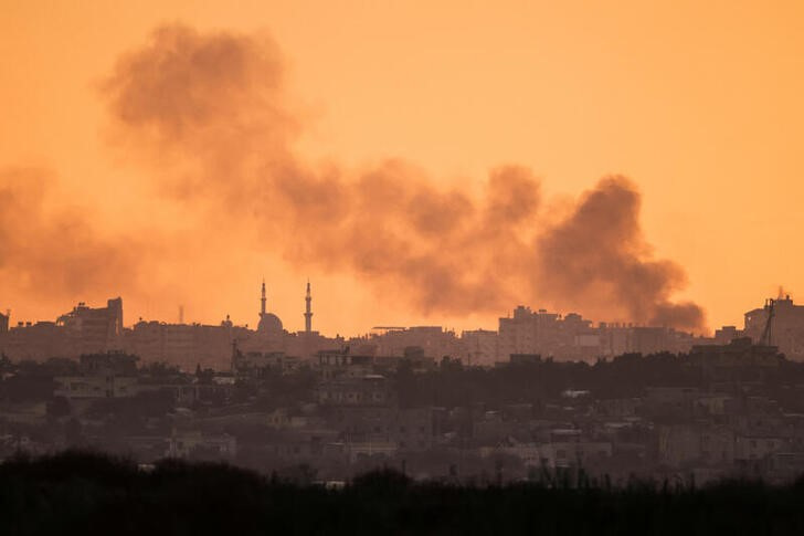 Smoke rises above southern Gaza, amid the ongoing conflict in Gaza between Israel and Palestinian Islamist group Hamas, as seen from Israel's border with Gaza