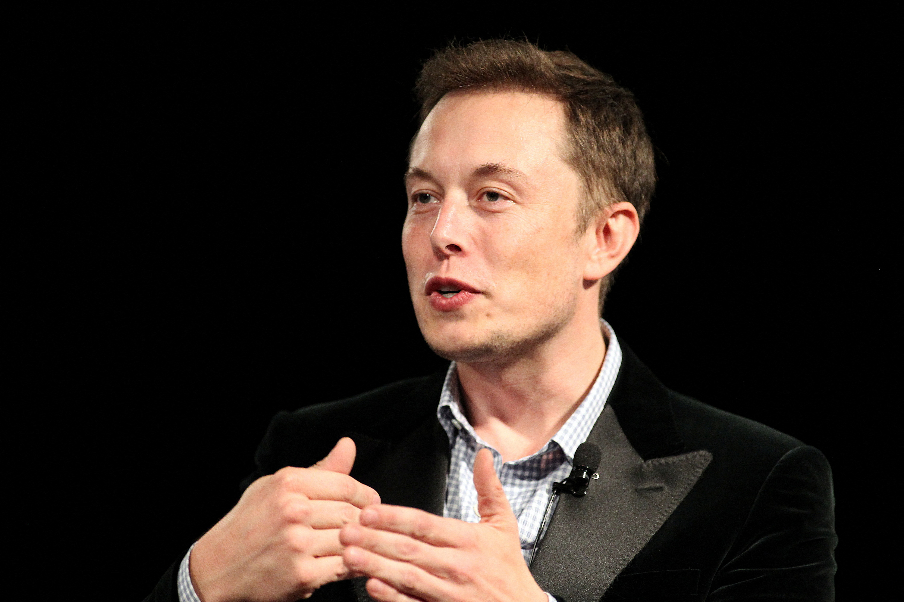 Tesla Motors CEO Elon Musk speaks at the Model S Beta Event held at the Tesla factory in Fremont