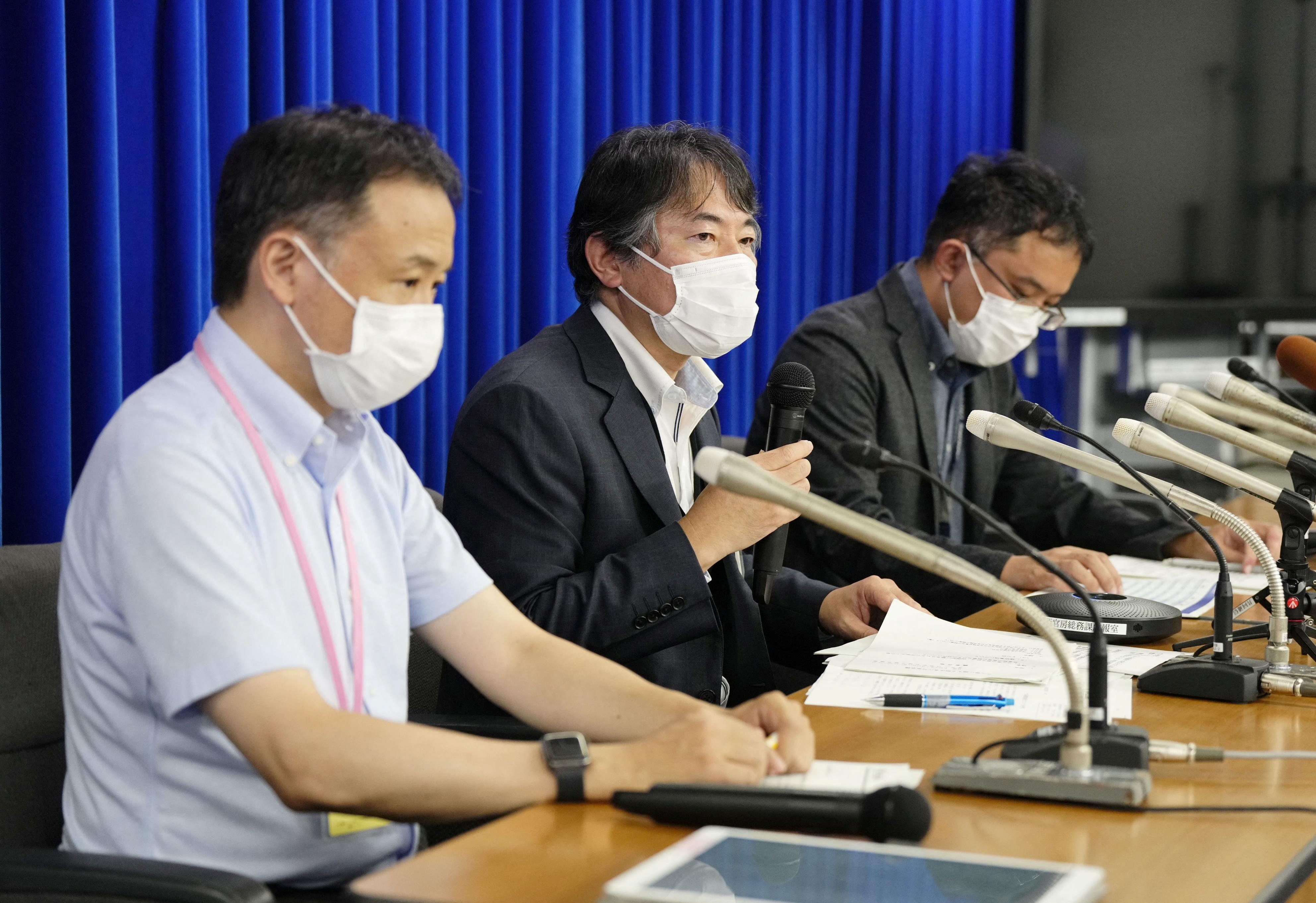 Director General of the Tuberculosis Infectious Diseases Division of Health Ministry Imagawa attends a news conference, in Tokyo