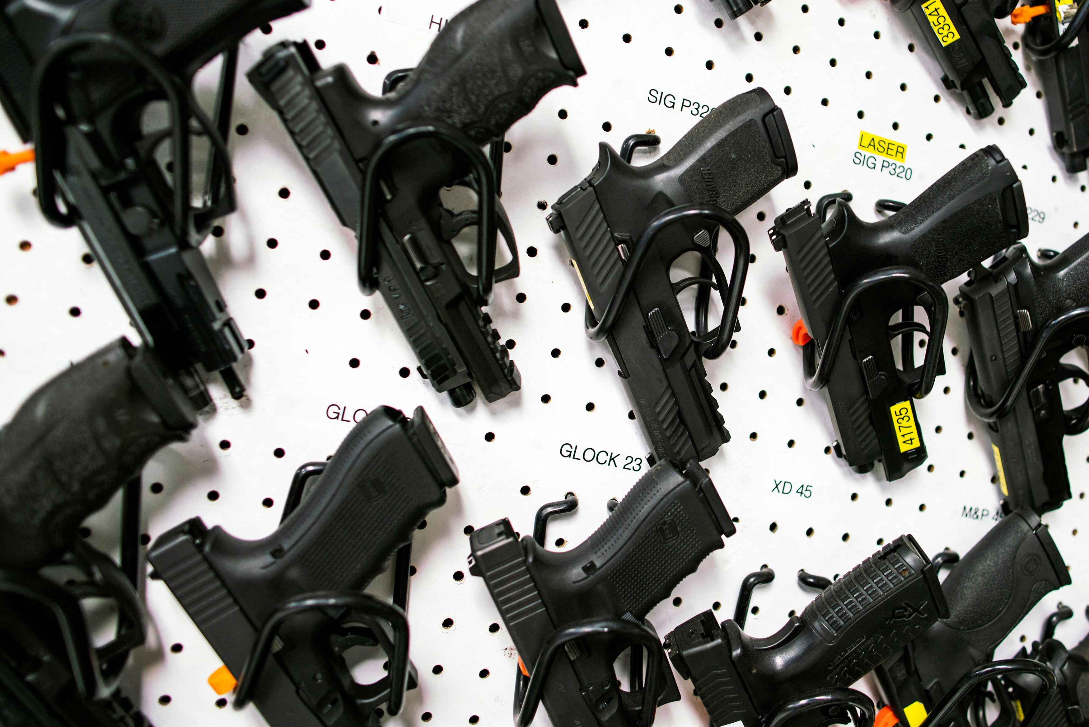 Guns are displayed at Shore Shot Pistol Range gun shop in Lakewood Township, New Jersey