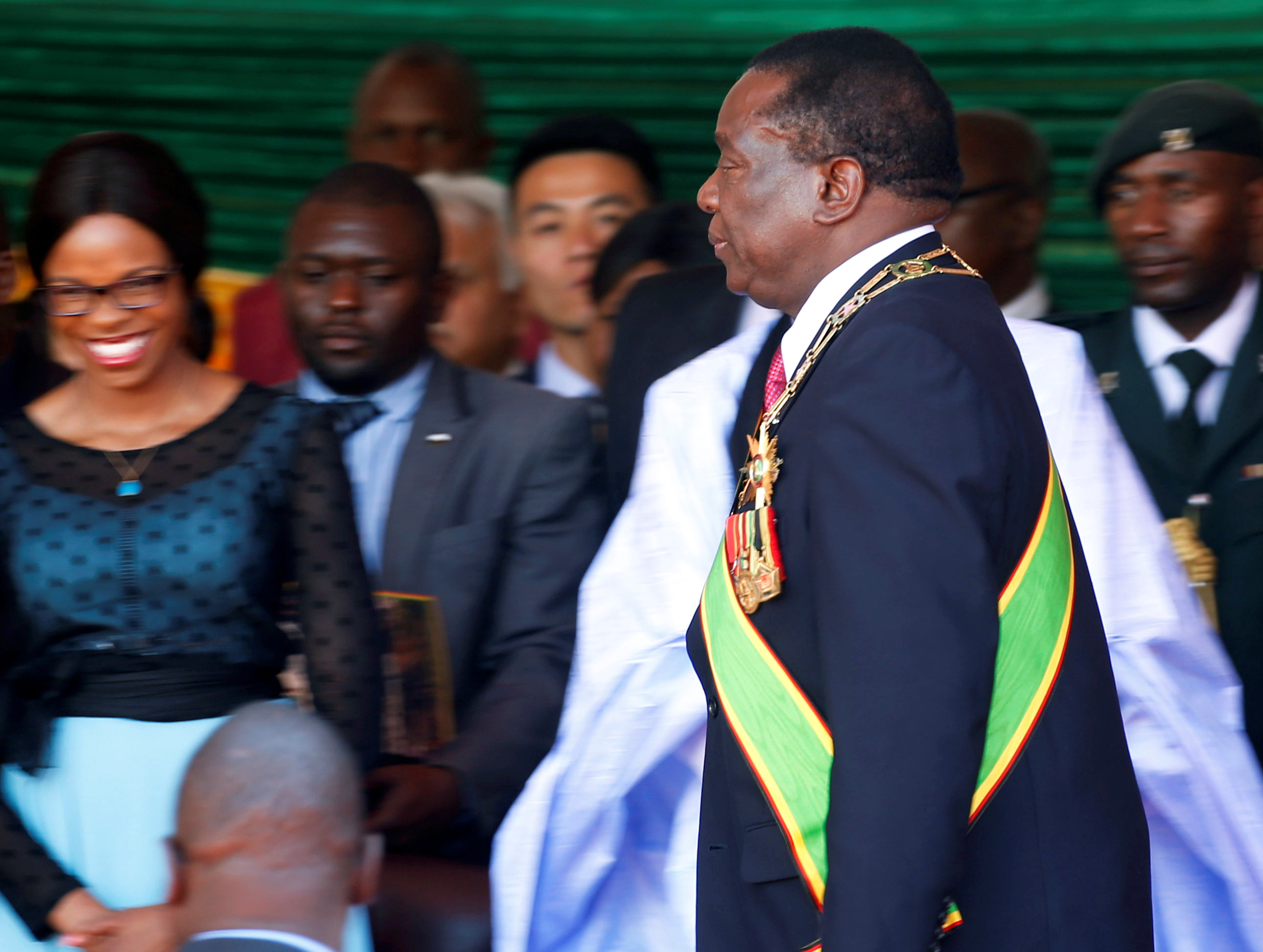 Dignitaries and supporters of Zimbabwe's President Emmerson Mnangagwa look on after he was sworn in during his presidential inauguration ceremony in Harare