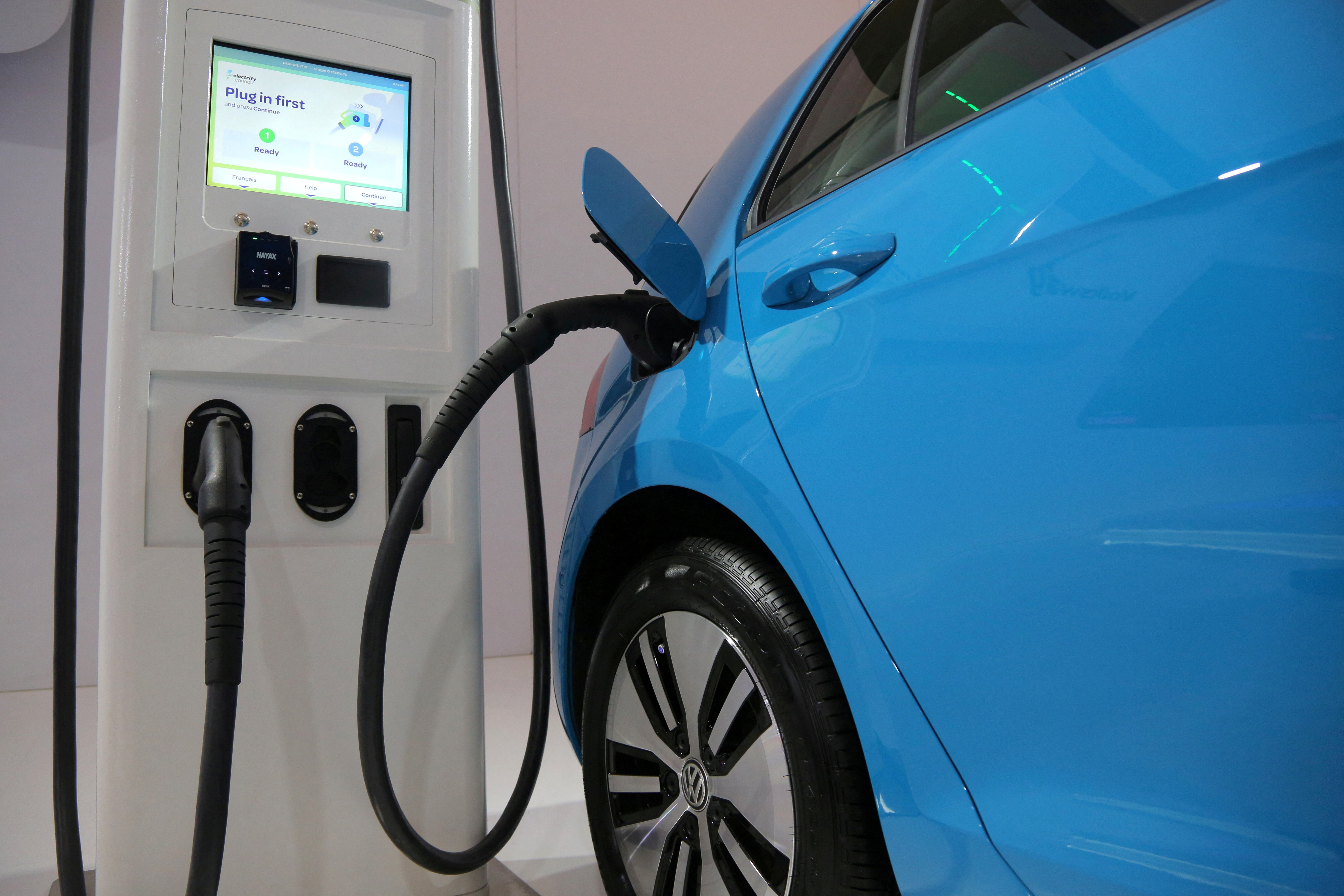 An electric vehicle charging station is seen at the Canadian International AutoShow in Toronto