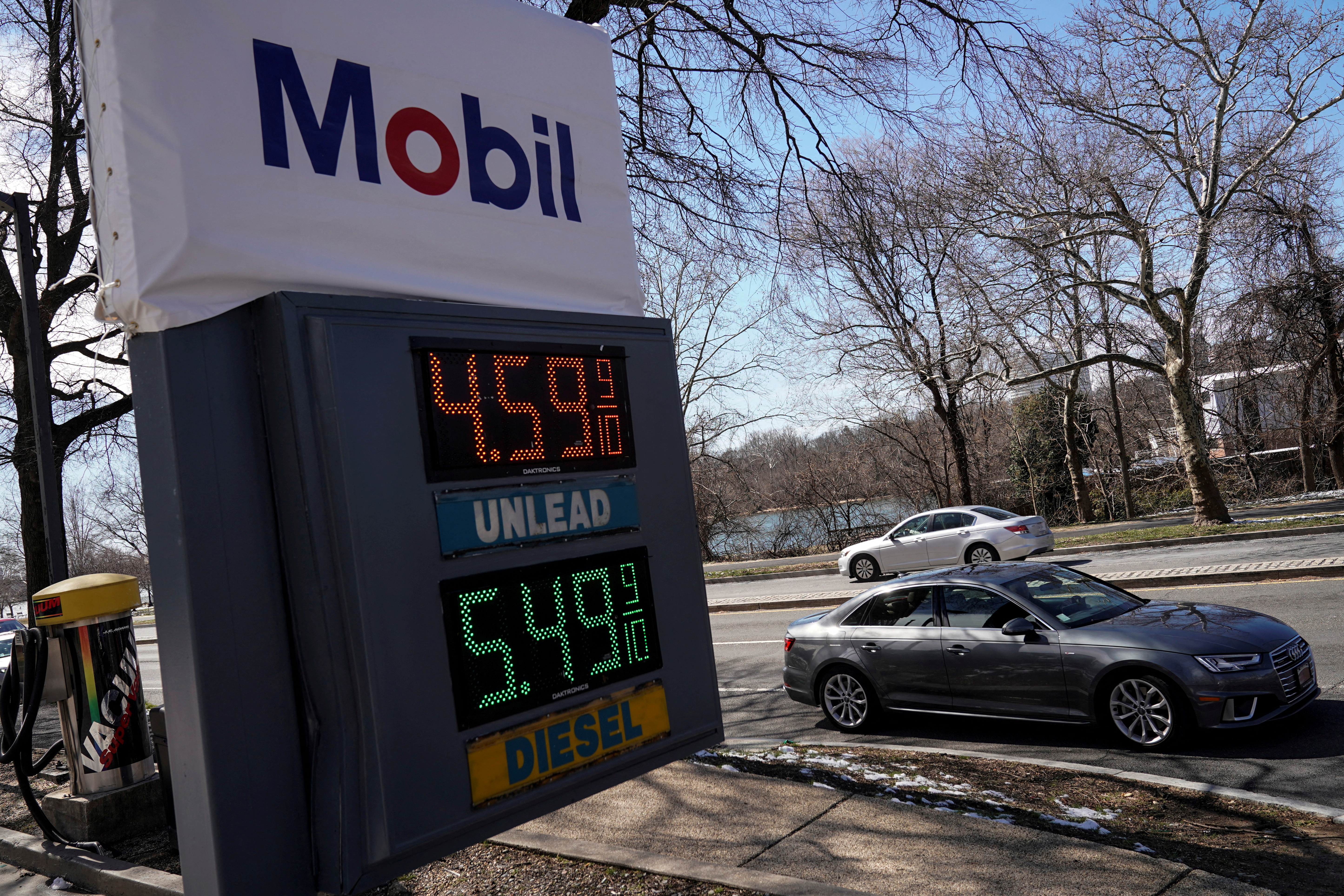 Gasoline prices are displayed at a gas station following Russia's invasion of Ukraine in Washington