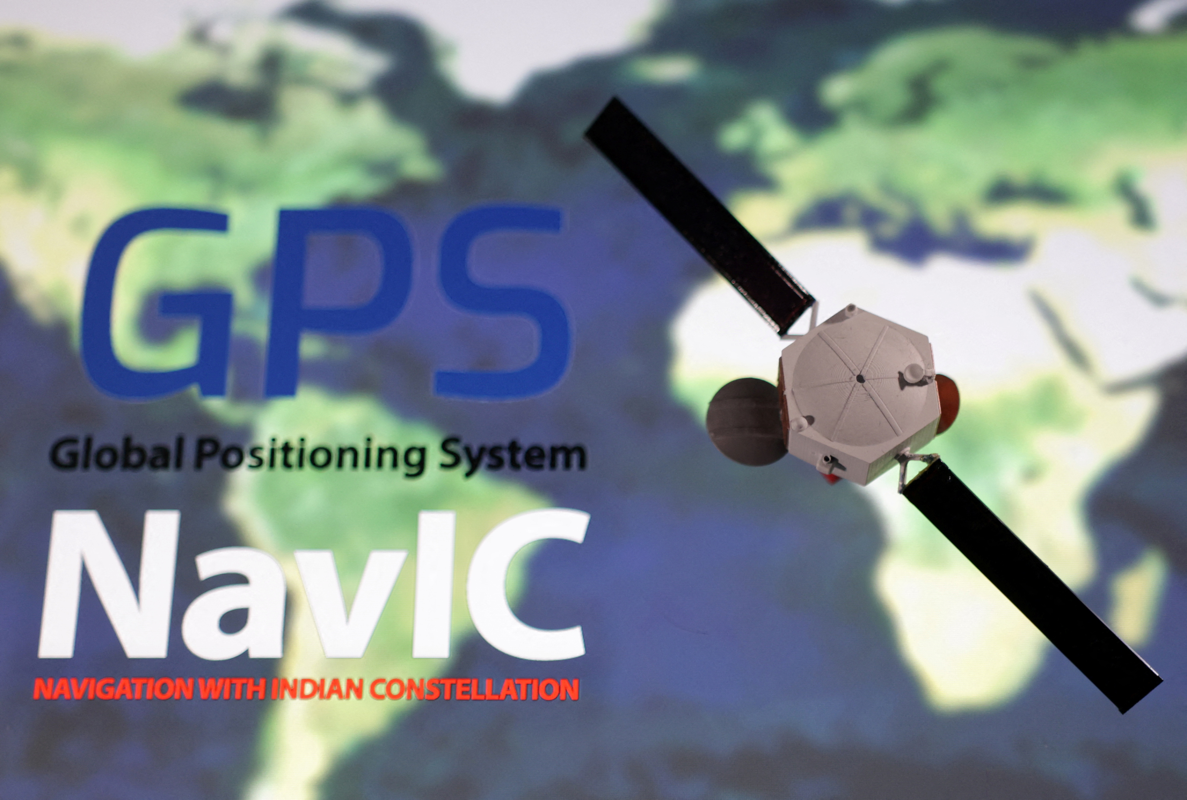 Illustration shows NavIC (Navigation with Indian Constellation) and GPS (Global Positioning System) logos
