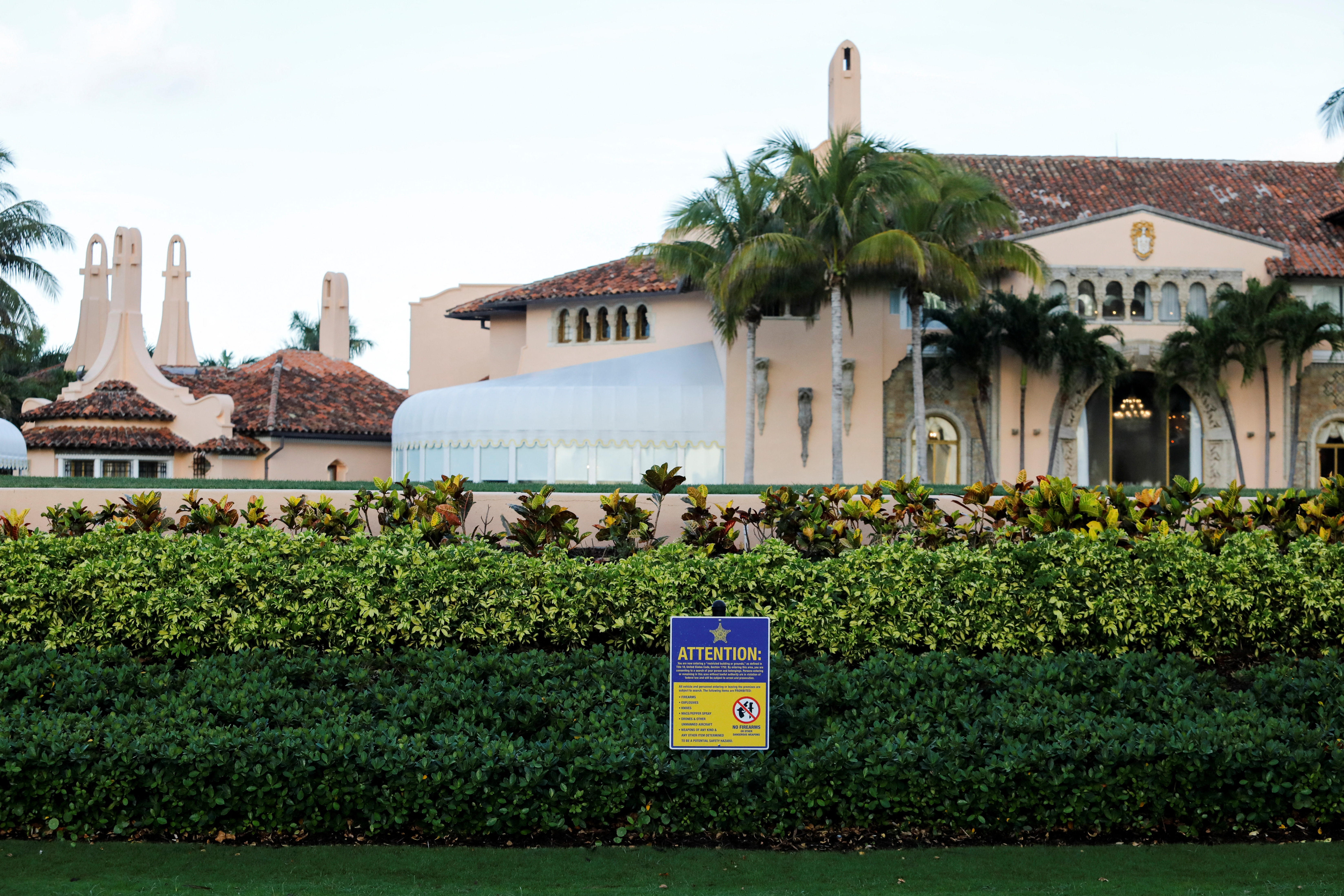 A Secret Service notification sign is seen in front of former U.S. President Donald Trump's Mar-a-Lago resort in Palm Beach
