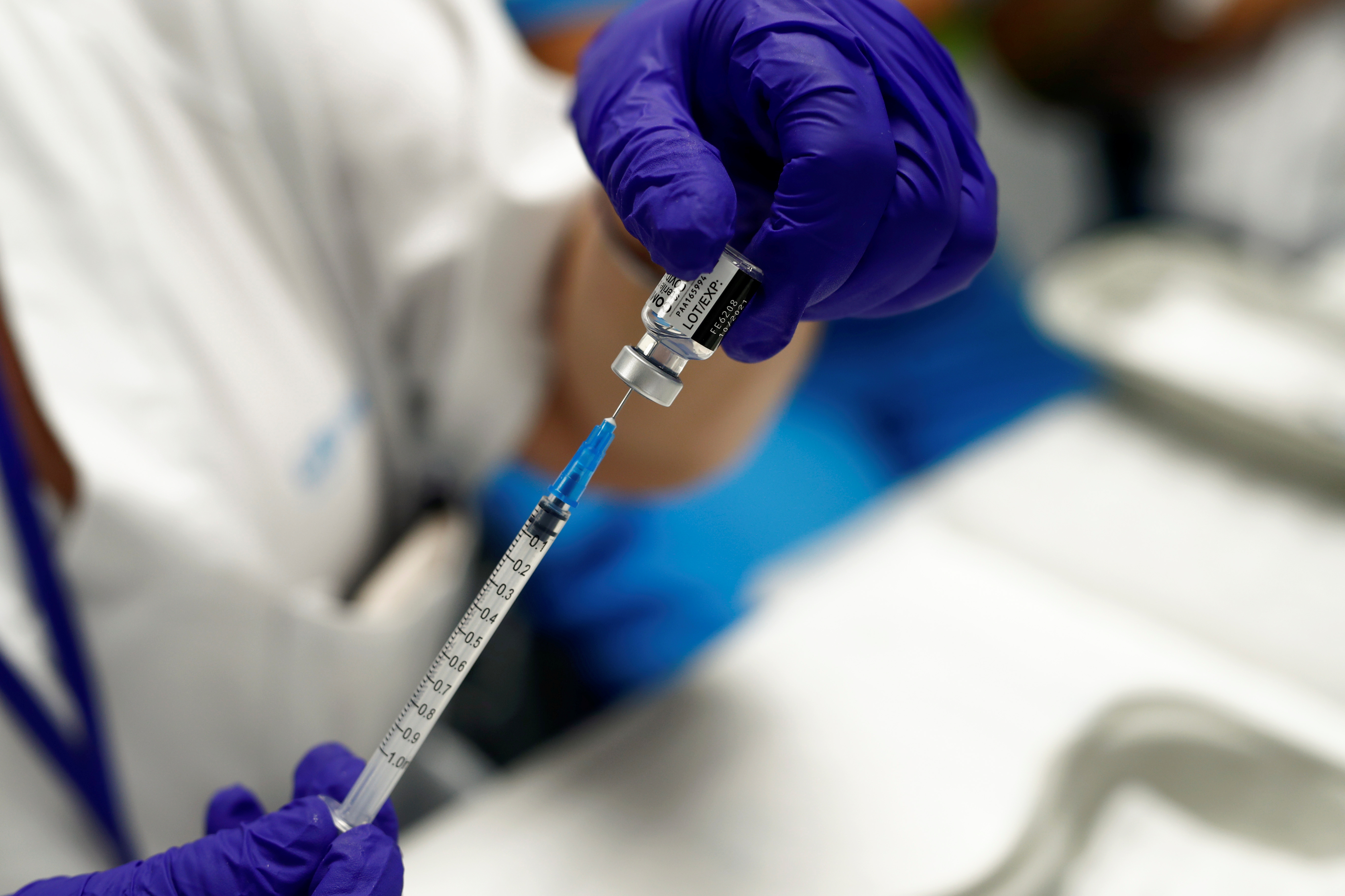 Spain extends vaccination to curb surge among population under 30