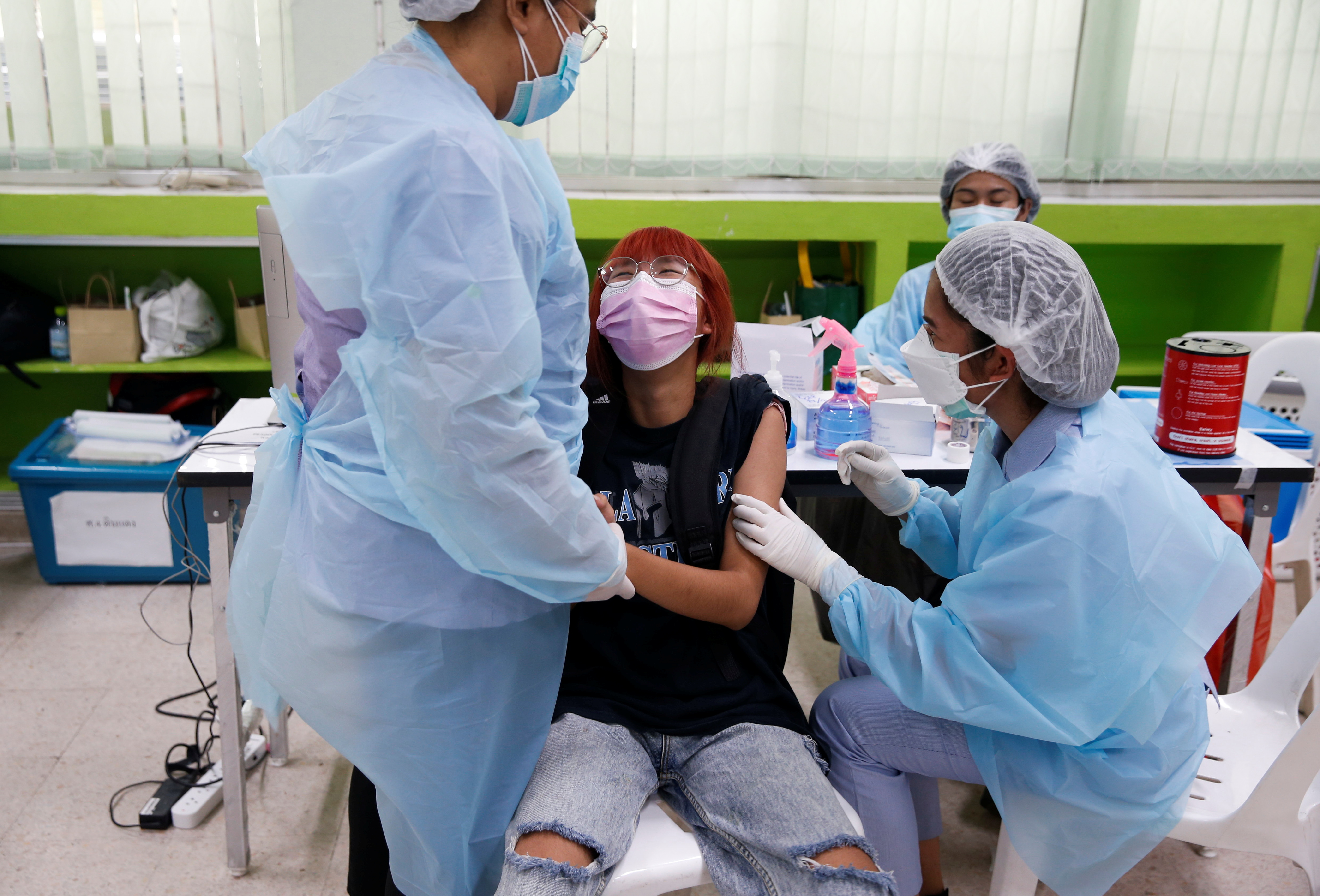 Ahead of schools reopening, high school students get vaccinated in Bangkok