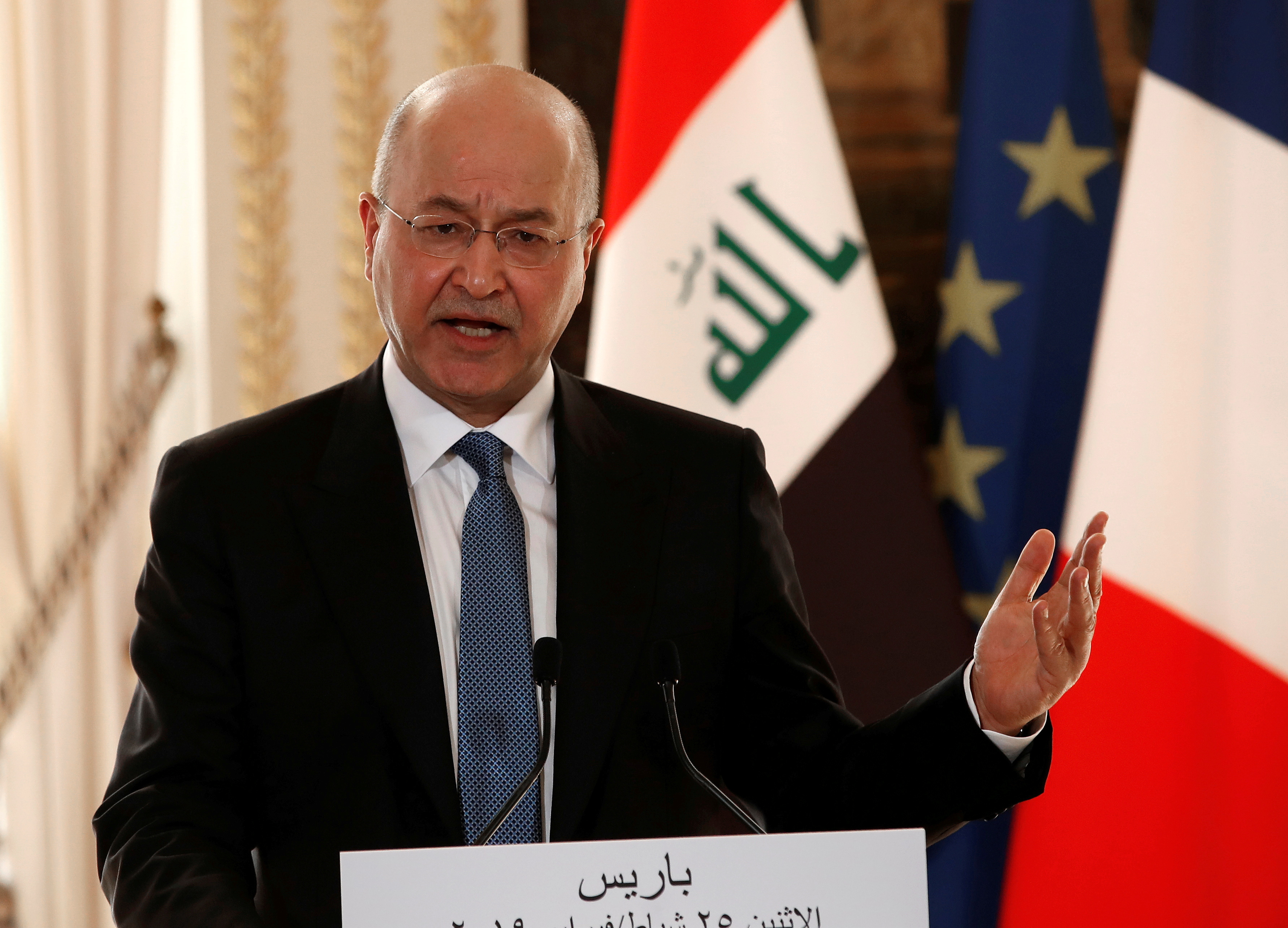 Iraqi President Barham Salih speaks during a news conference at the Elysee Palace in Paris, France,