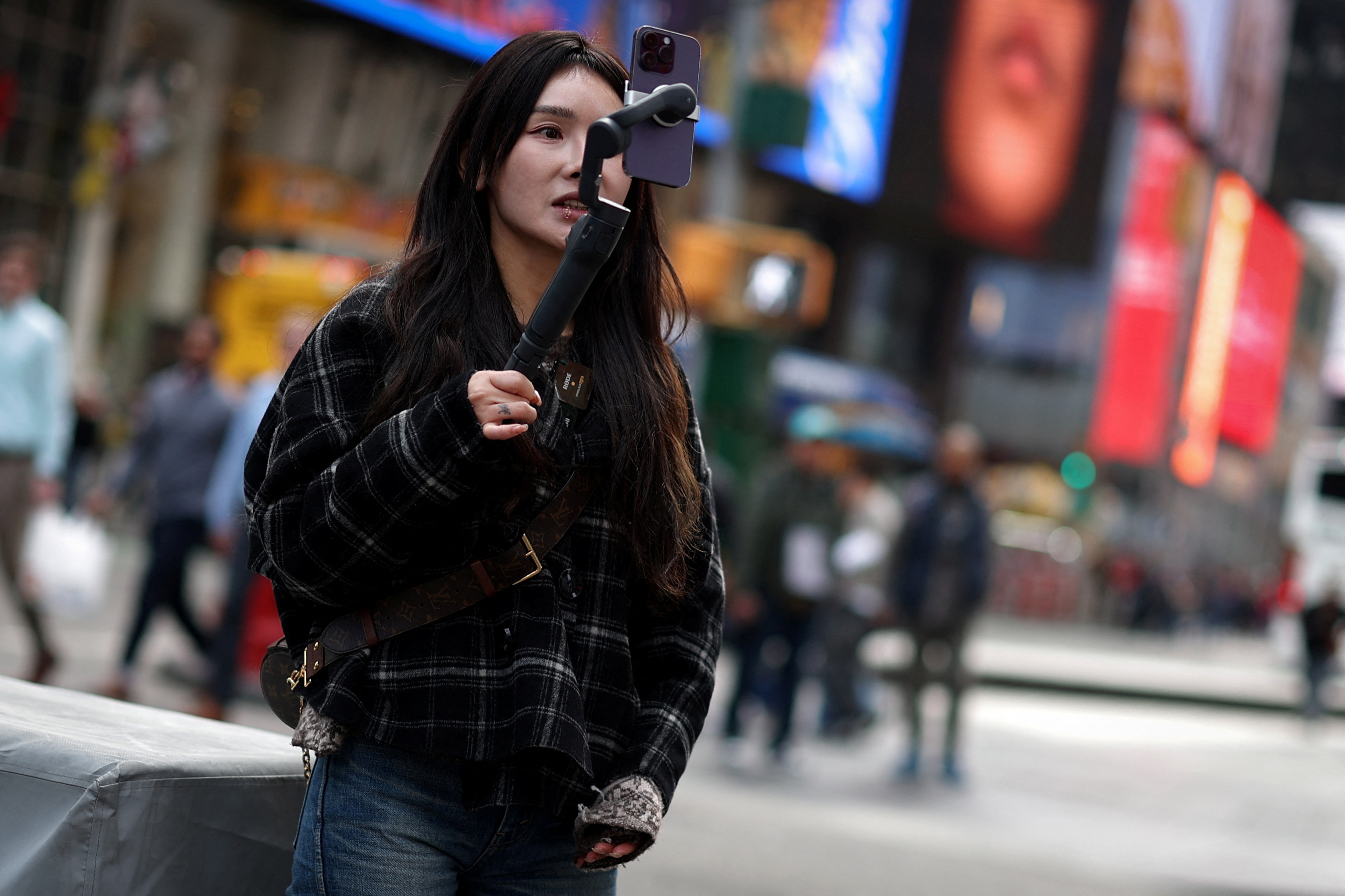 TikTok users in Times Square in New York City