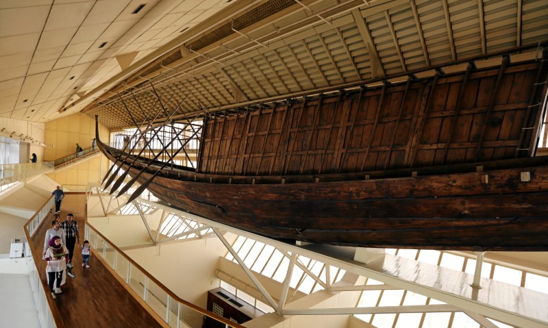 King Khufu's solar boat is displayed at a museum on the northern side of Khufu's Great Pyramid