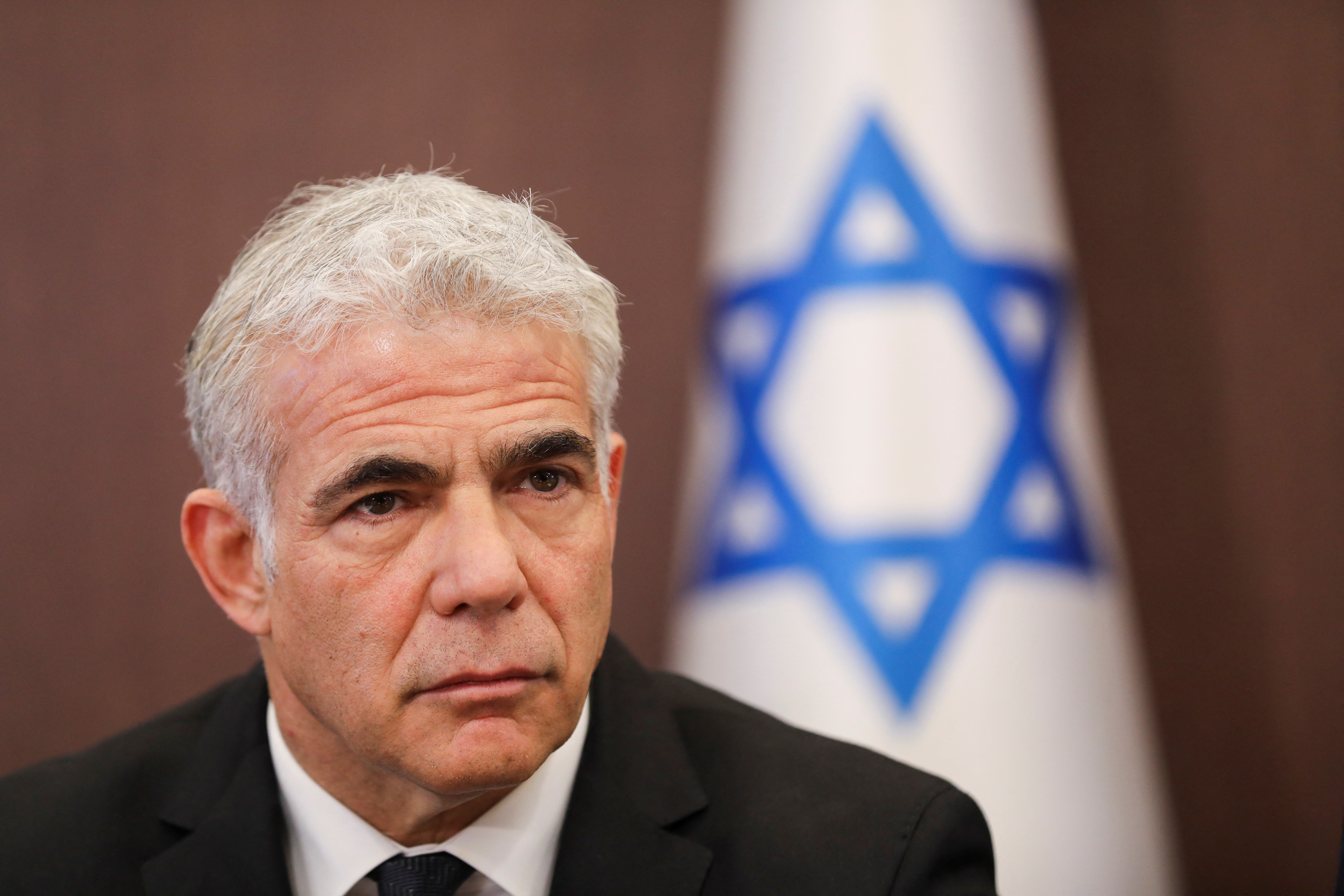 Israeli Foreign Minister Yair Lapid attends a cabinet meeting at the Prime Minister's office in Jerusalem