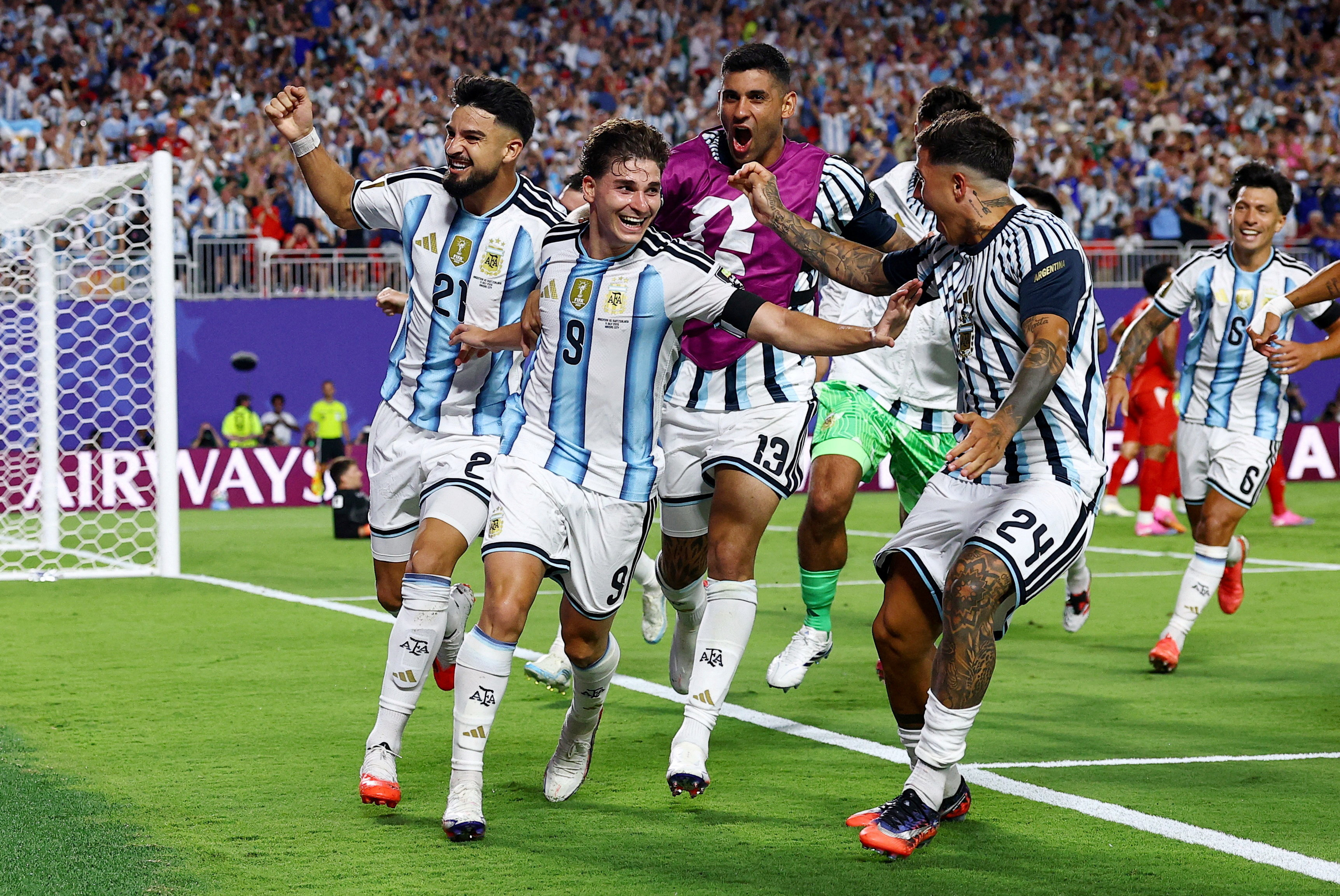 Argentina strike late in extra time to sink 10-man Swiss and reach