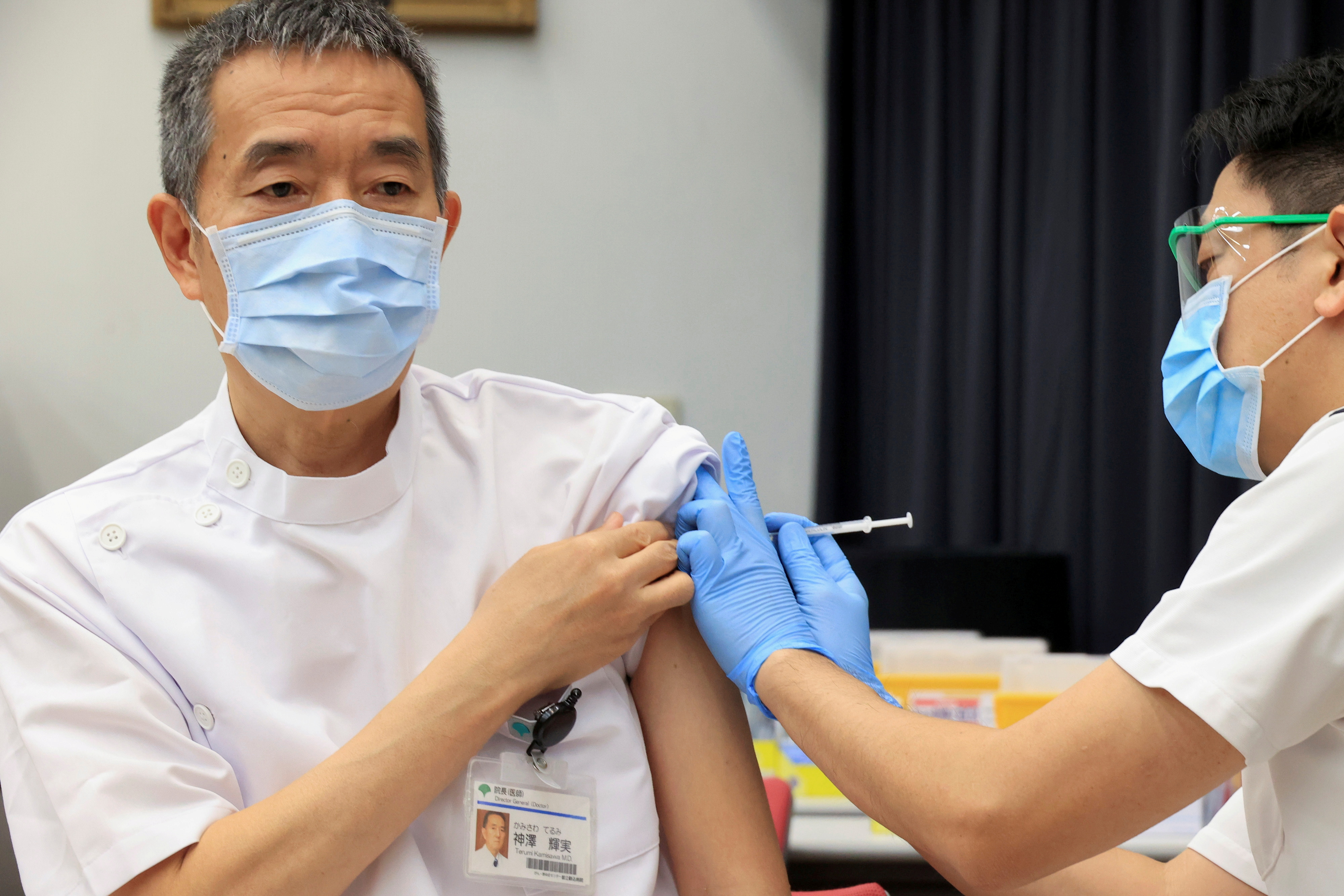 Medical workers receive doses of the vaccine against the coronavirus disease (COVID-19) at the Tokyo Metropolitan Cancer and Infectious Diseases Center Komagome Hospital in Tokyo