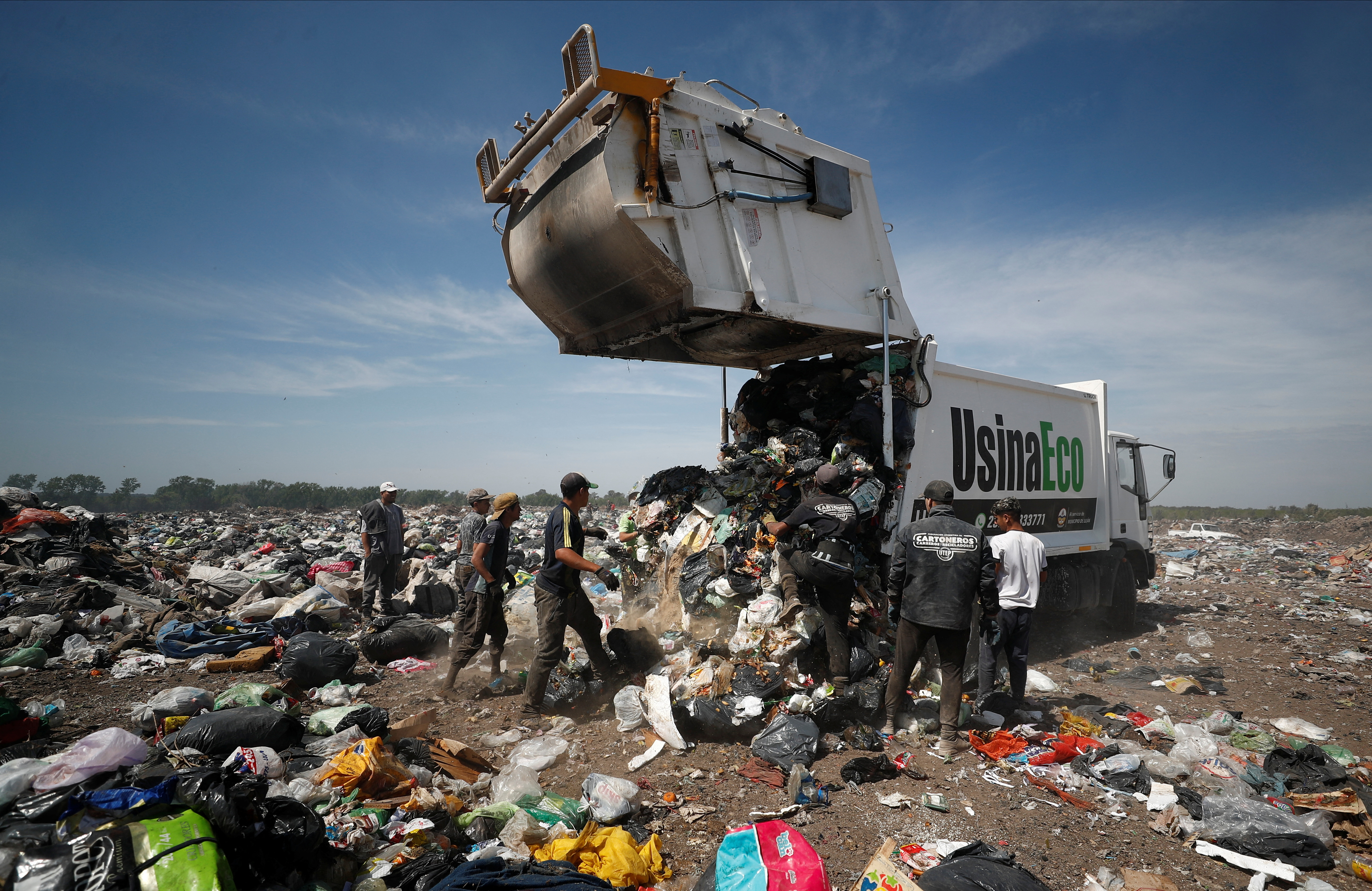Barter clubs and rubbish dumps: poor Argentines feel the pain of 100% inflation