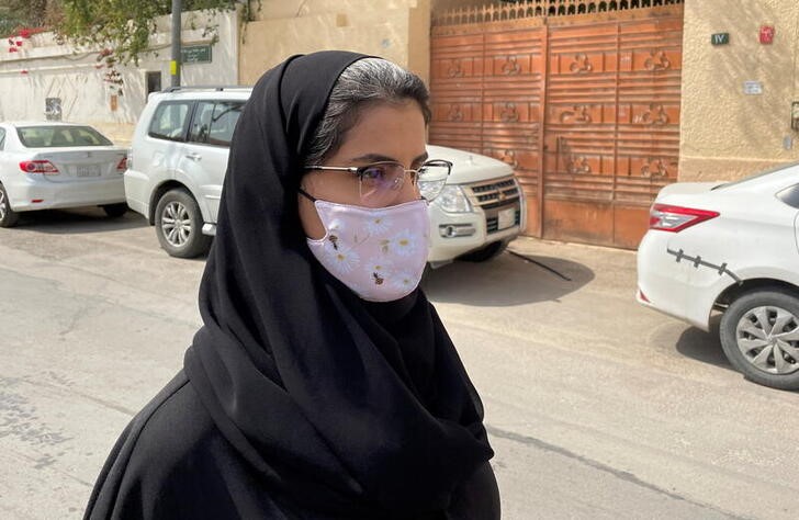 Saudi activist Loujain Al-Hathloul makes her way to appear at a special criminal court for an appeals hearing in Riyadh