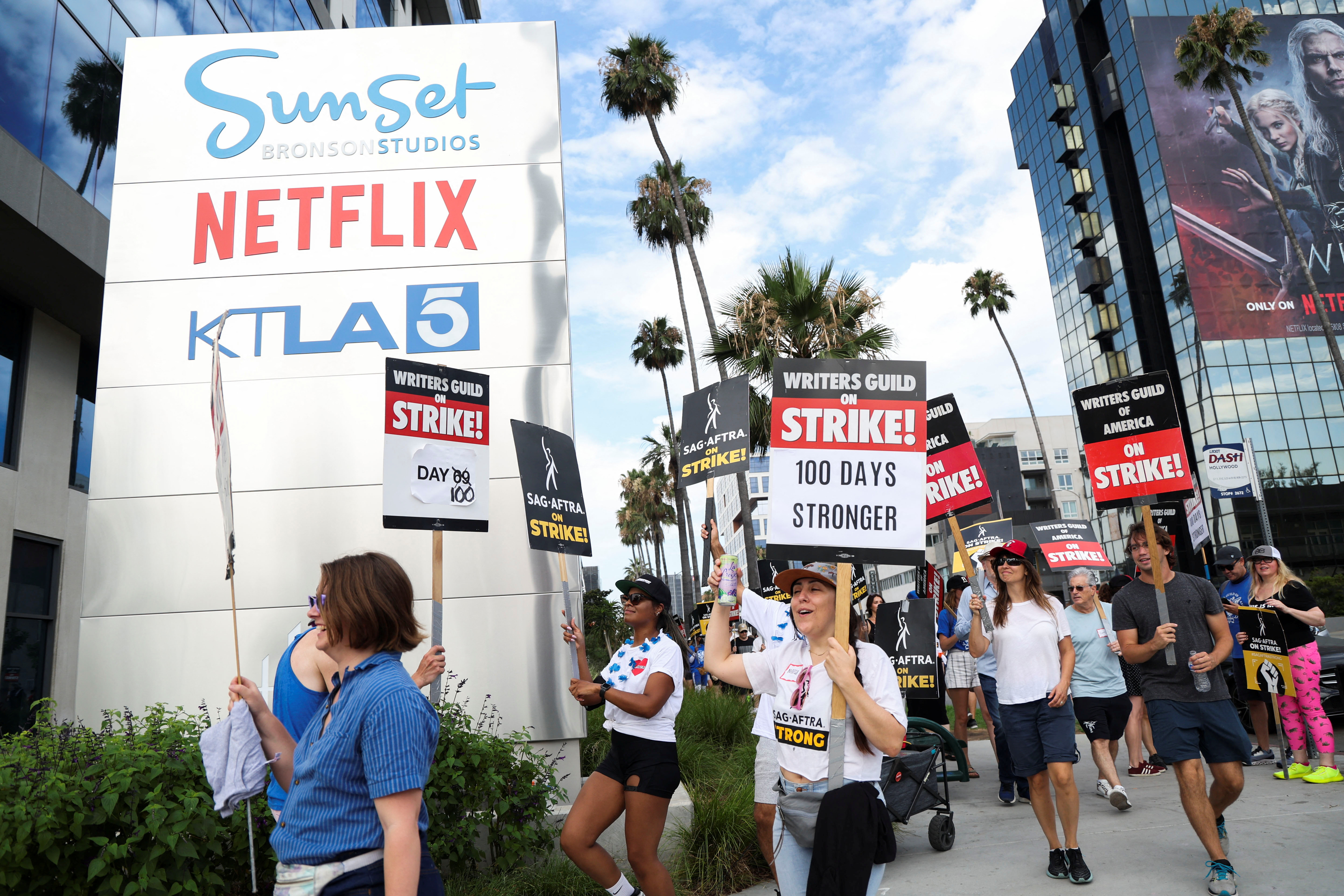 100-day strike: Hollywood writers show unity and anger on picket lines | Reuters