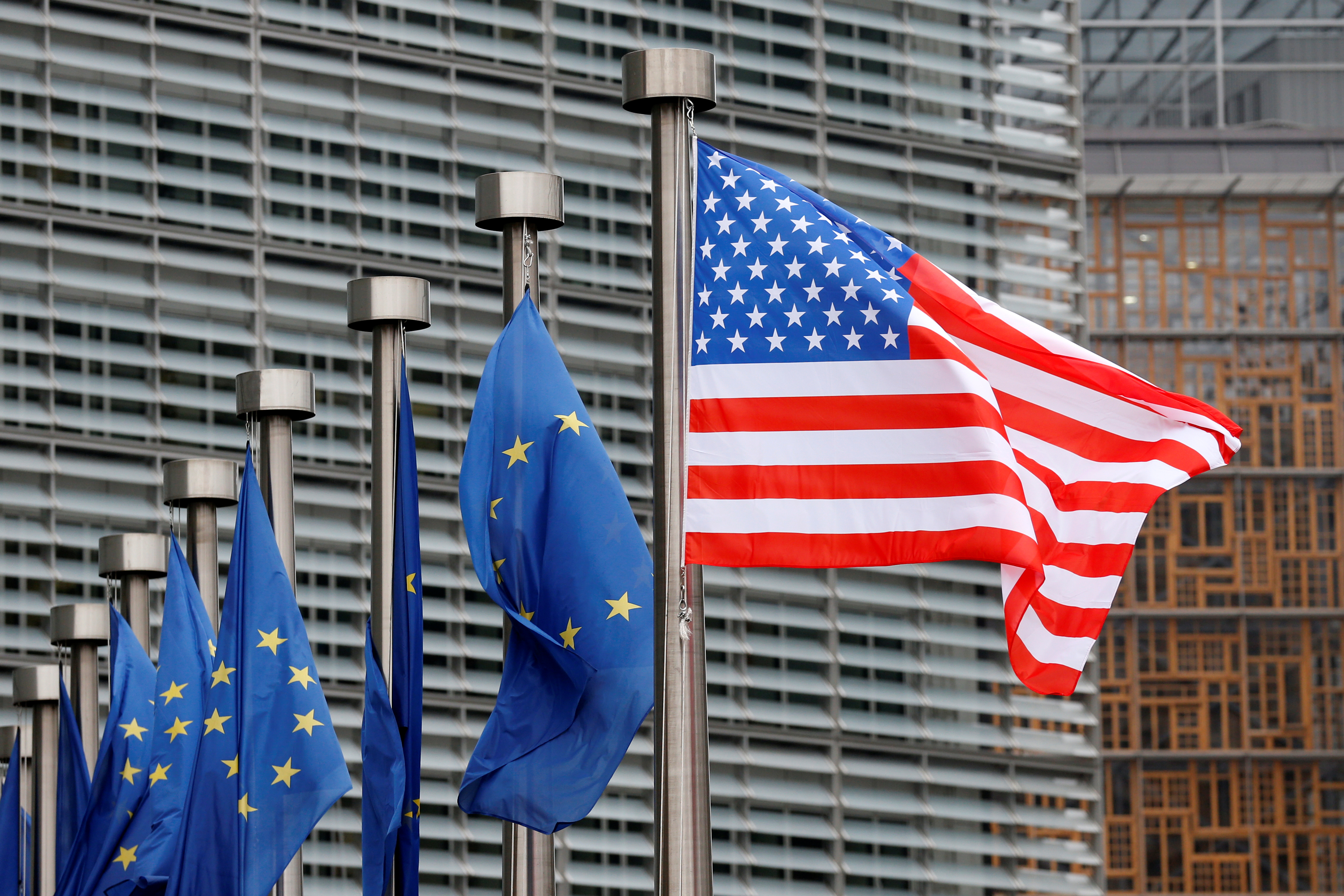 U.S. and EU flags are pictured during the visit of Vice President Pence to the European Commission headquarters in Brussels