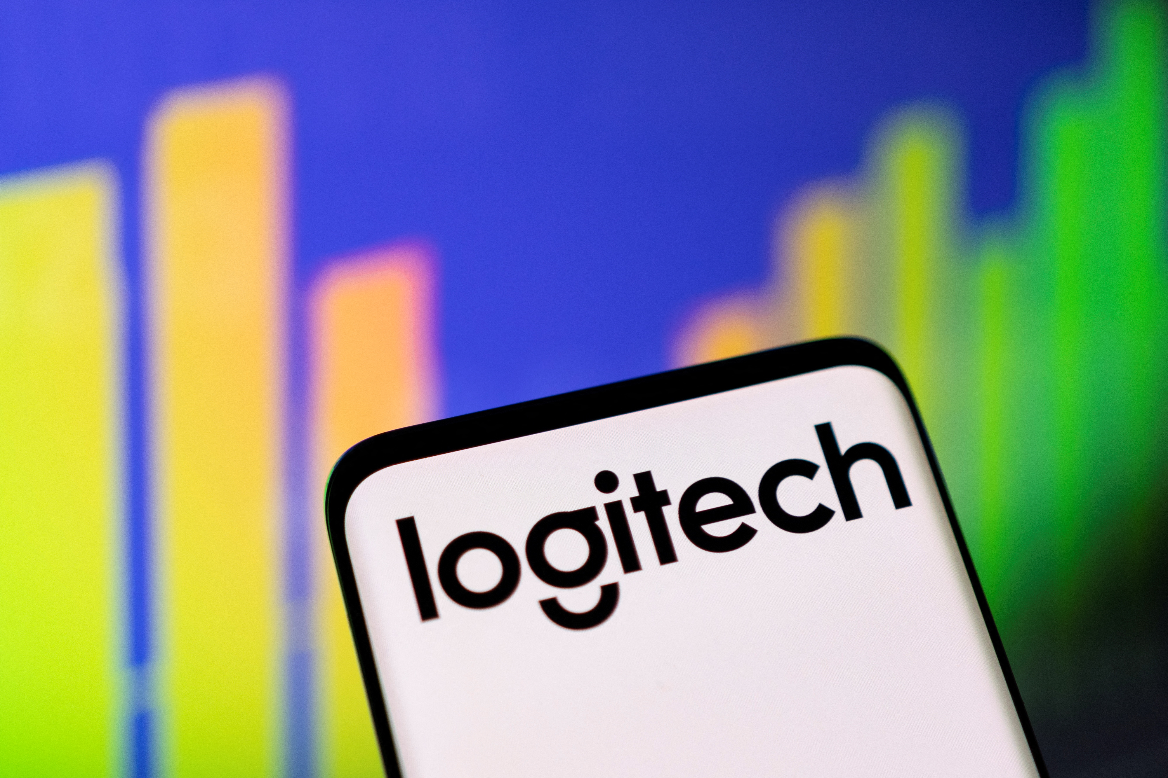 Illustration shows Logitech logo and stock graph