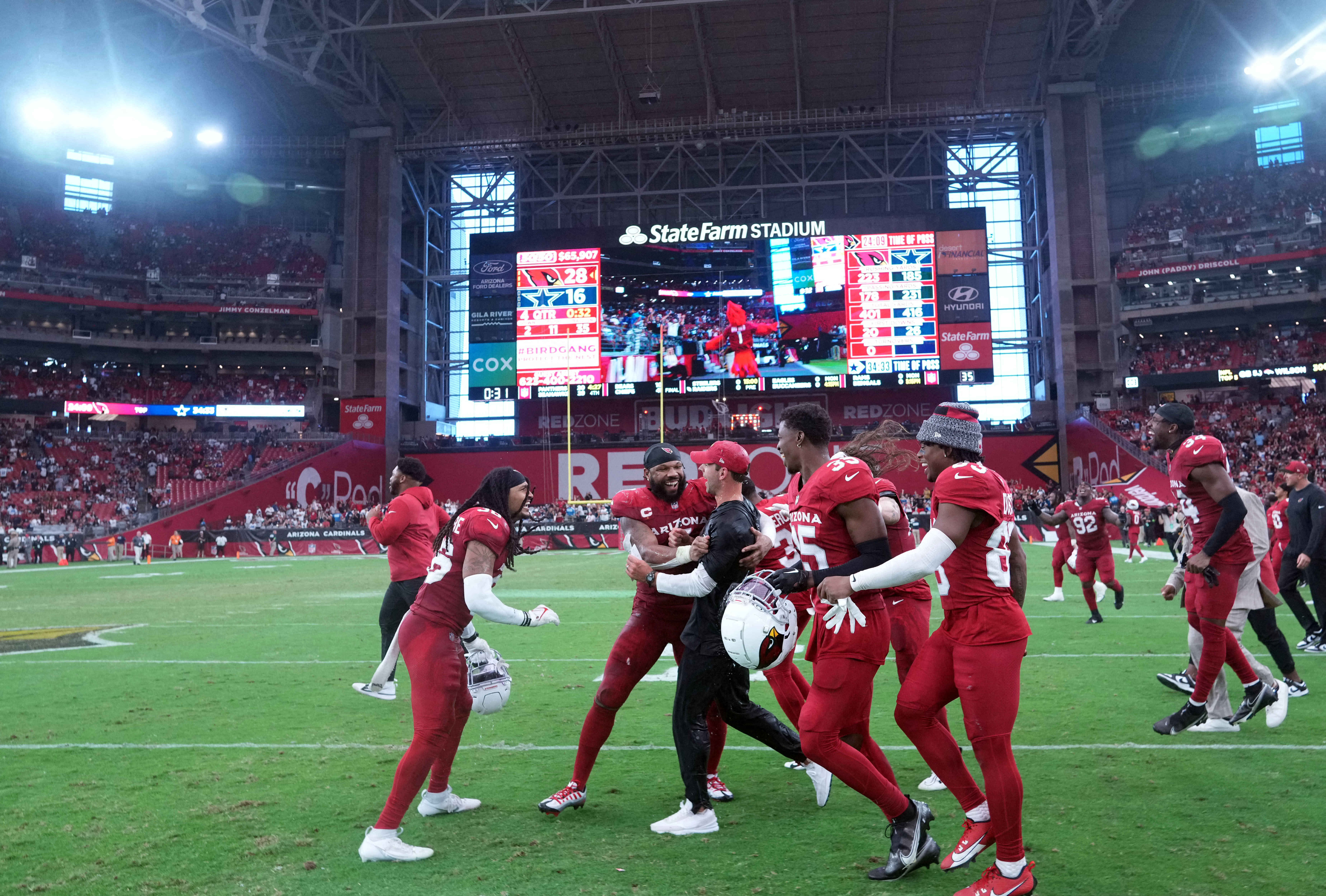 Arizona Cardinals mascot Big Red celebrates a touchdown against