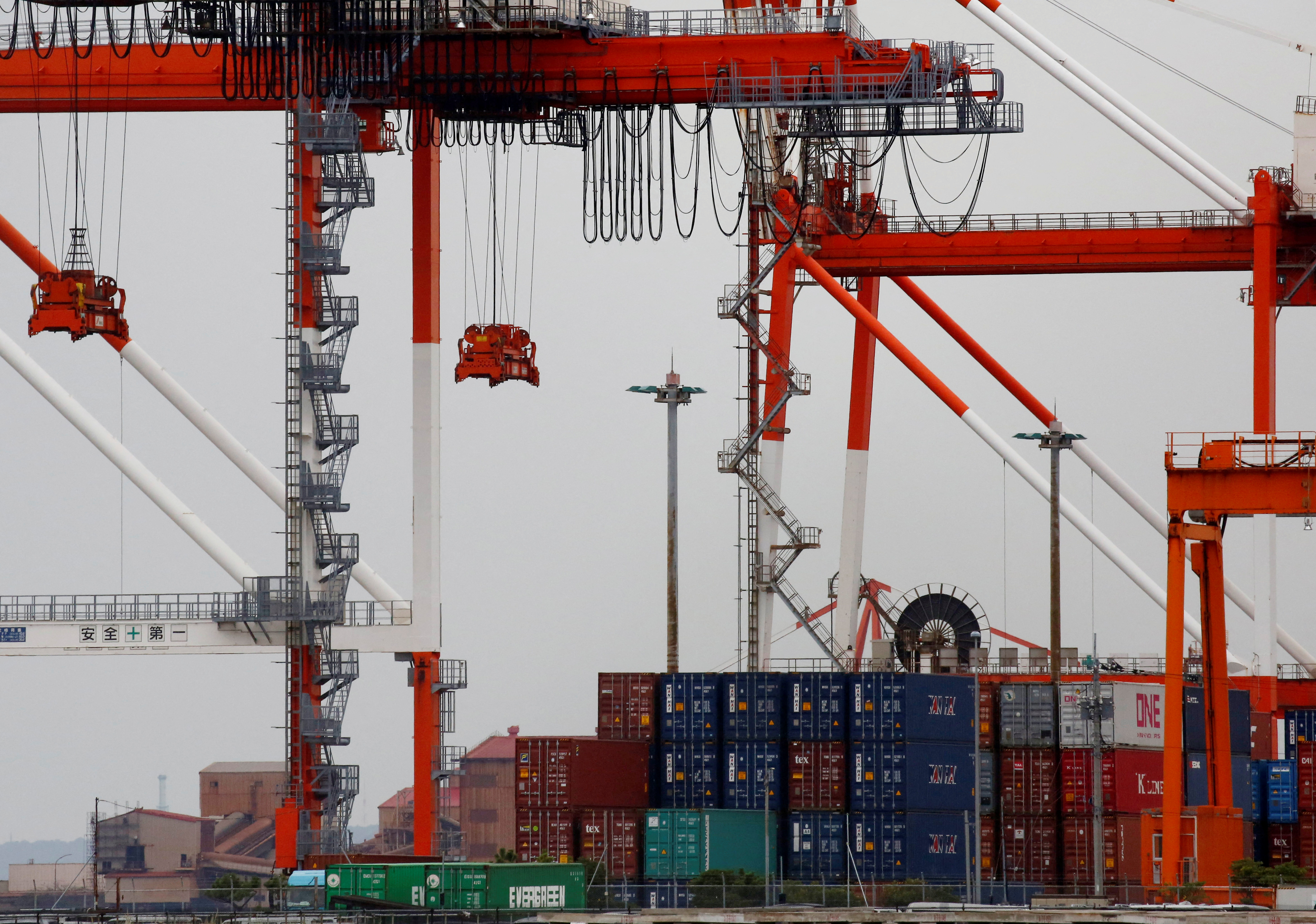 Containers are seen at an industrial port in the Keihin Industrial Zone in Kawasaki