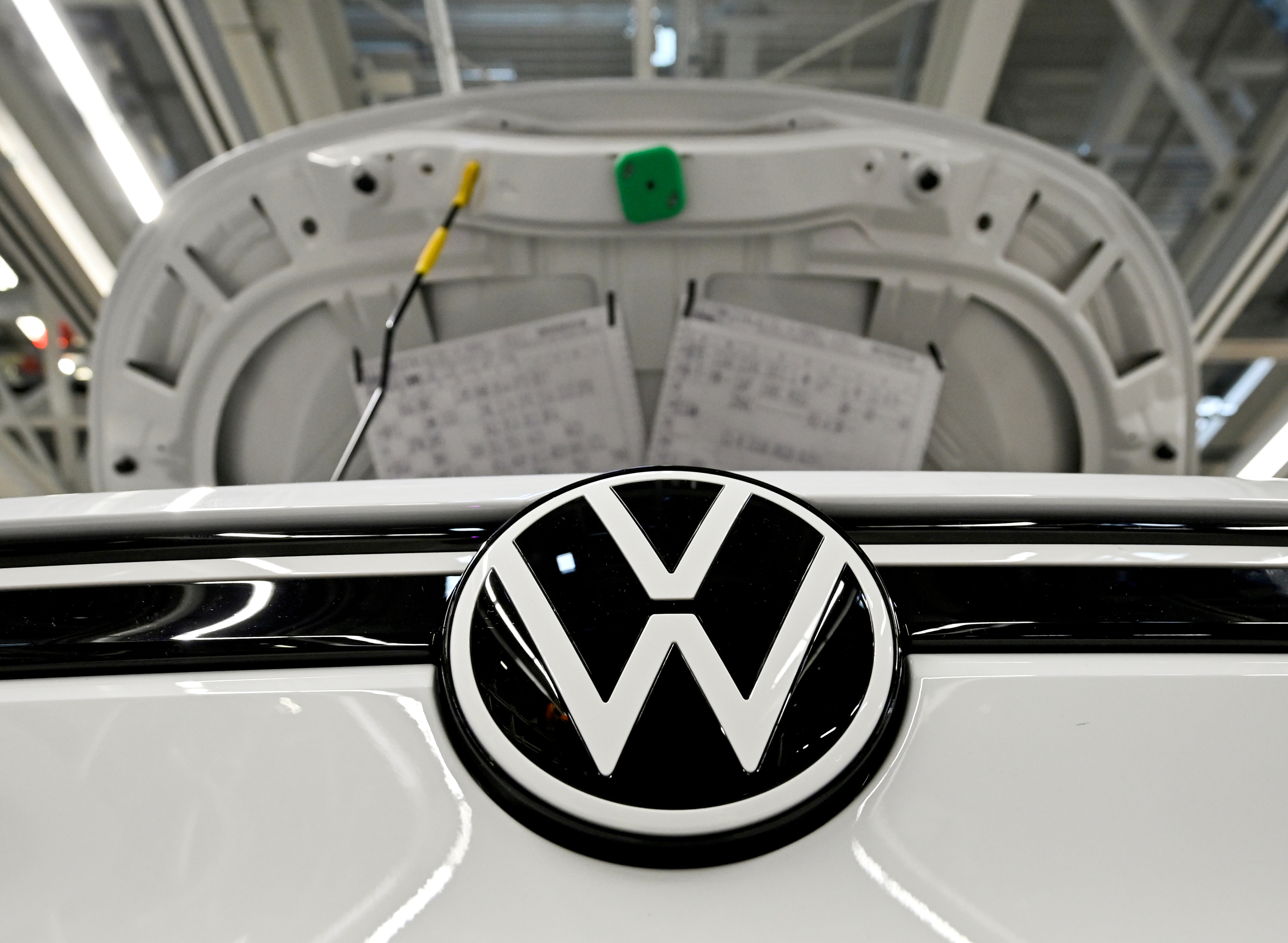 Turning coronavirus corner, Volkswagen's profit falls less than feared |  Reuters