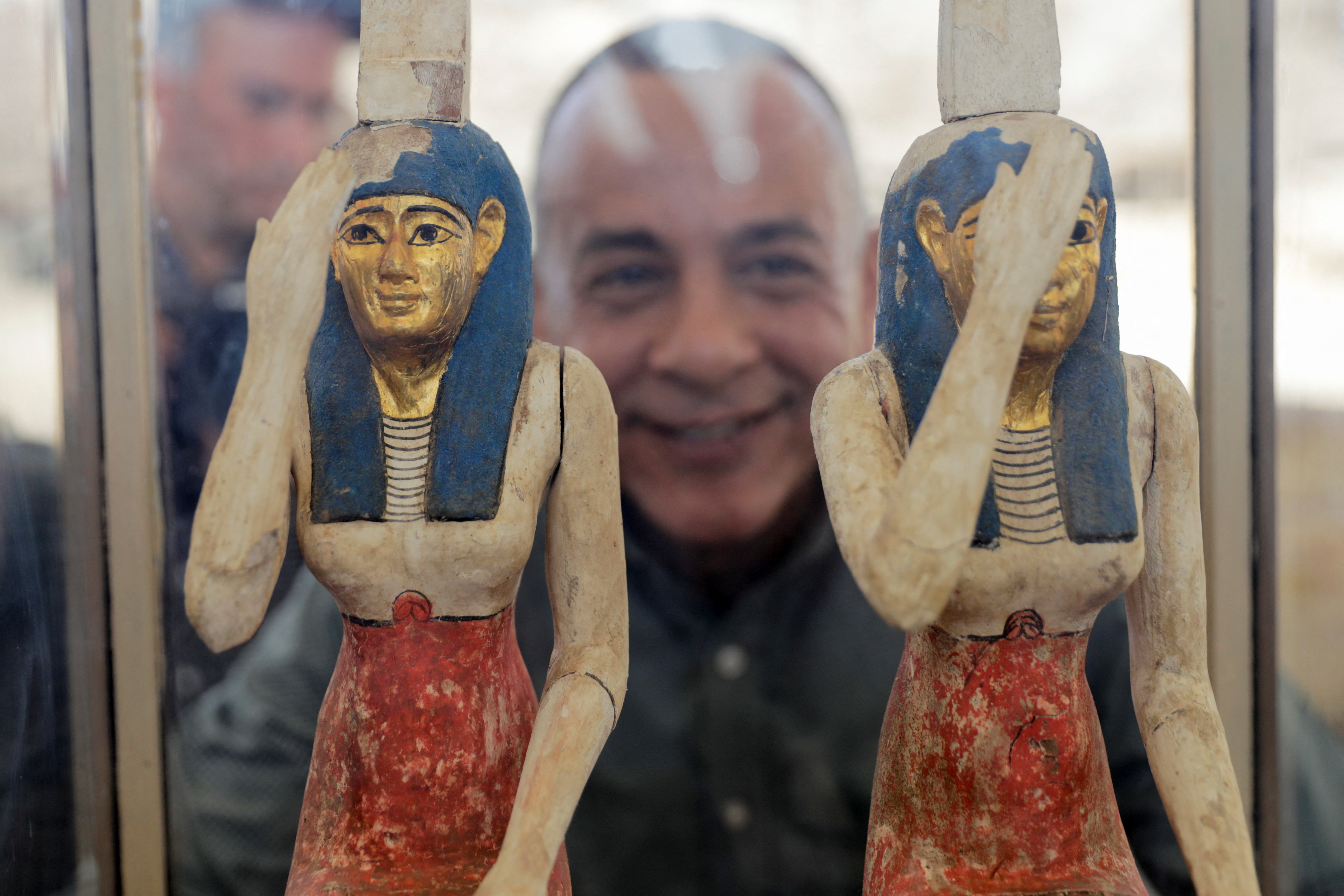 Figurines from the newly discovered burial site displayed during a presentation in Giza