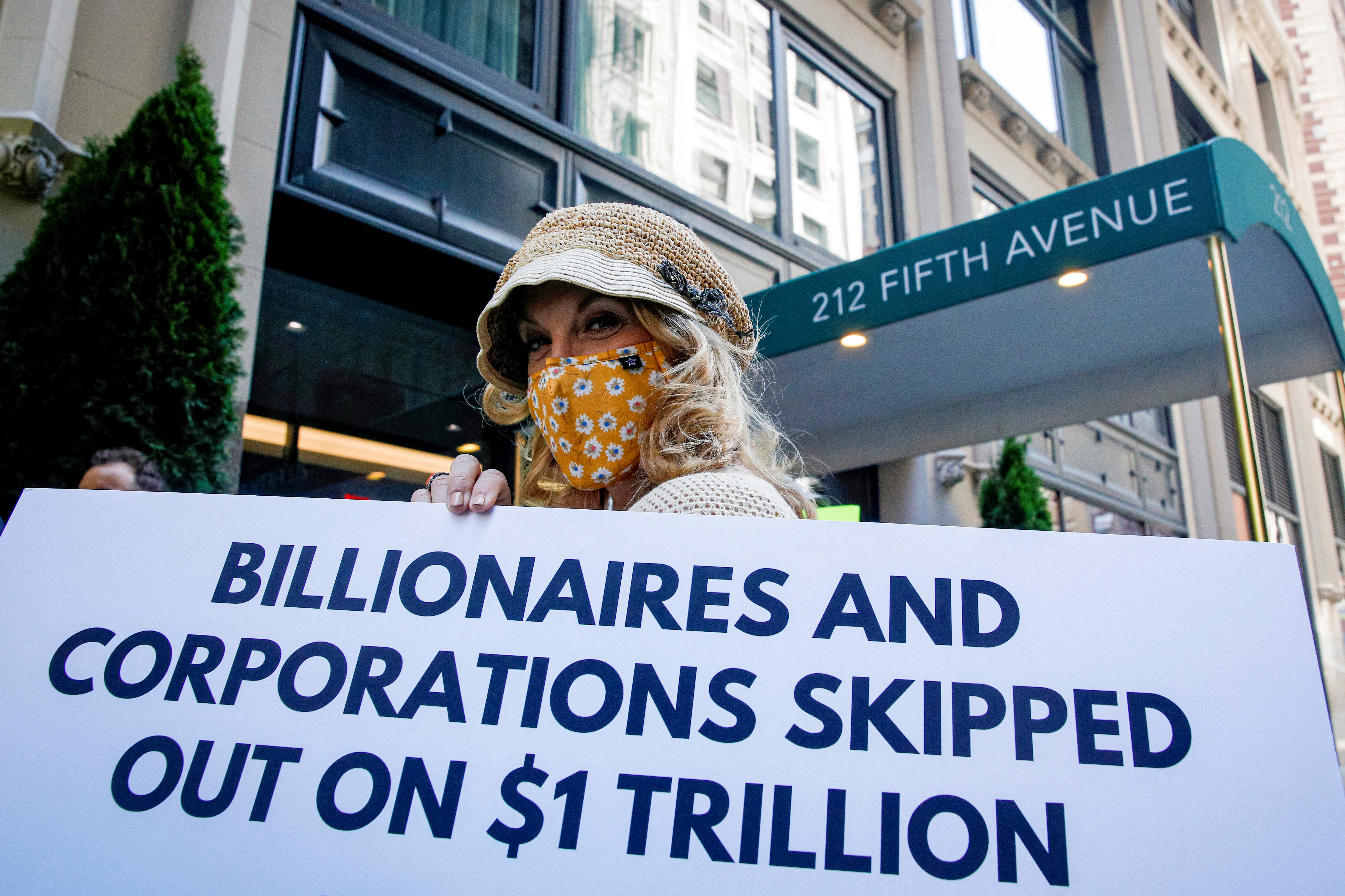 Members of the Patriotic Millionaires hold a federal tax filing day protest in New York