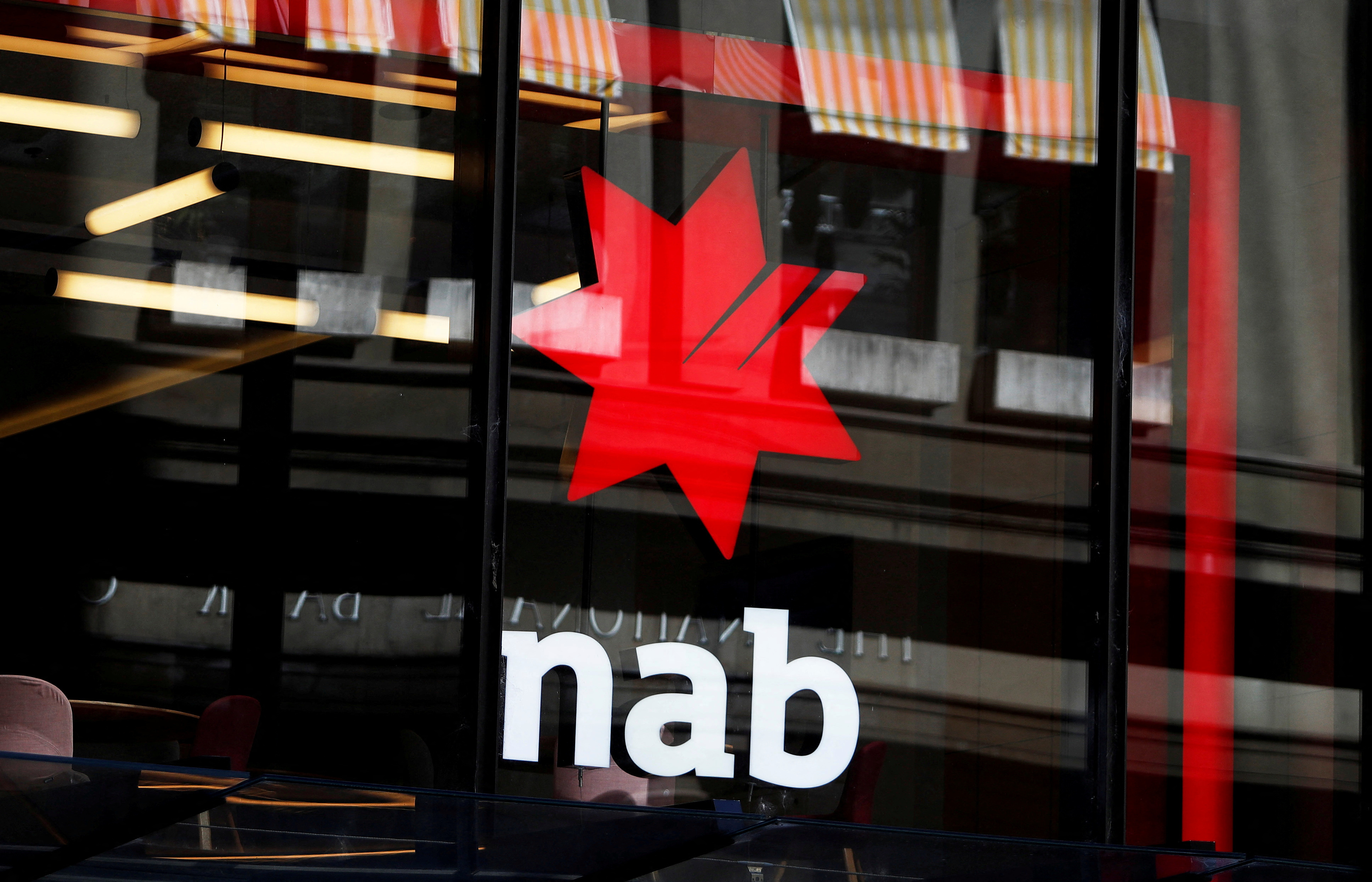 The National Australia Bank Logo is seen on a branch in central Sydney