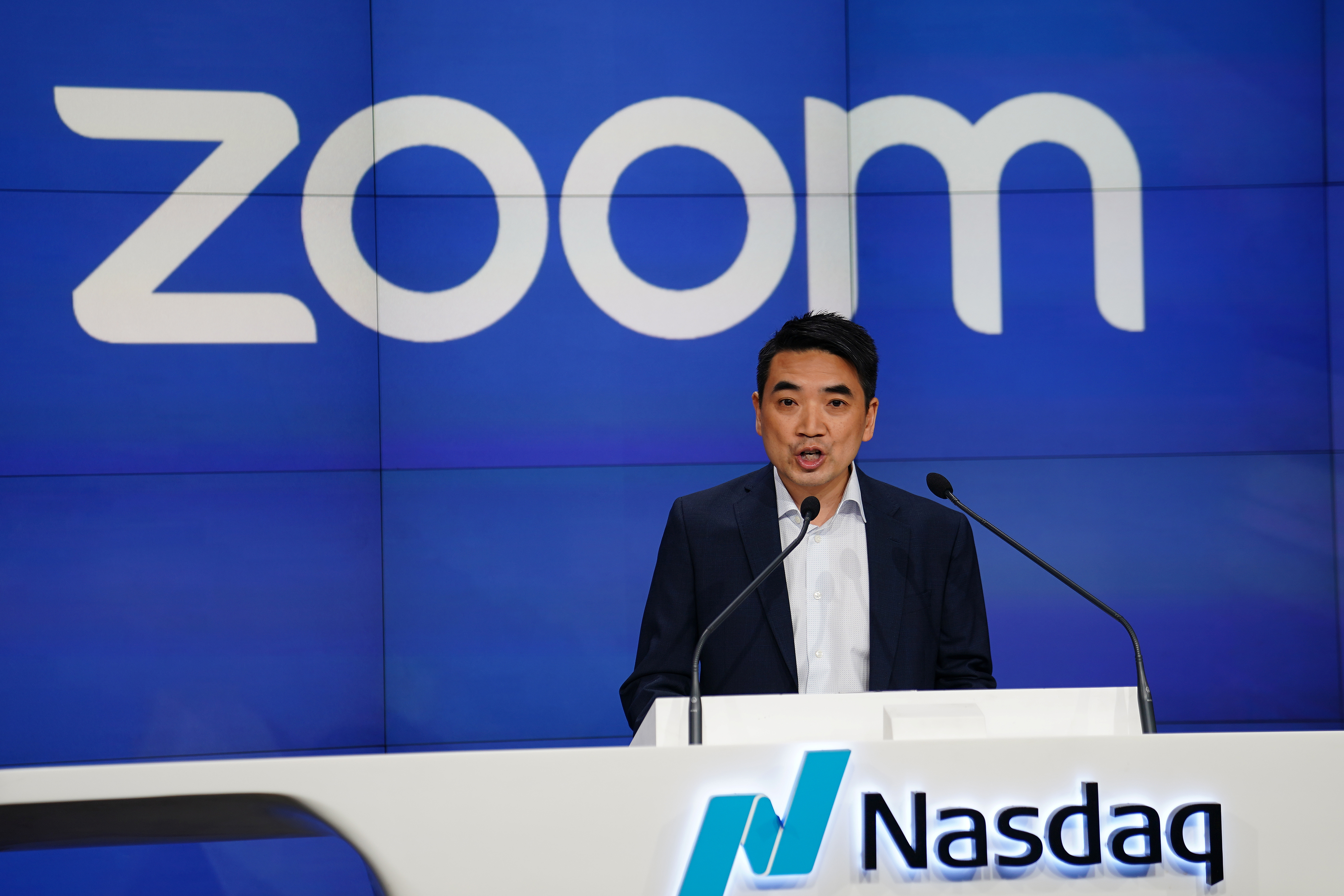 Eric Yuan, CEO of Zoom Video Communications takes part in a bell ringing ceremony at the NASDAQ MarketSite in New York