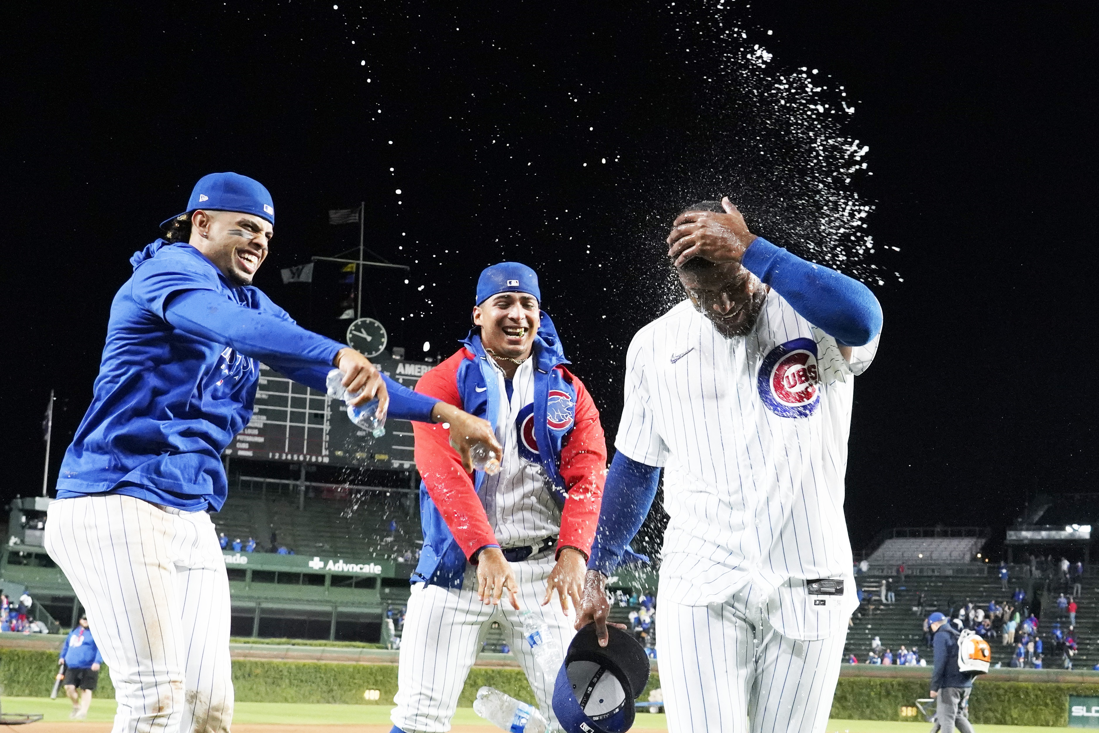 Canario hits grand slam, Cubs rout Pirates, 14-1, to remain in