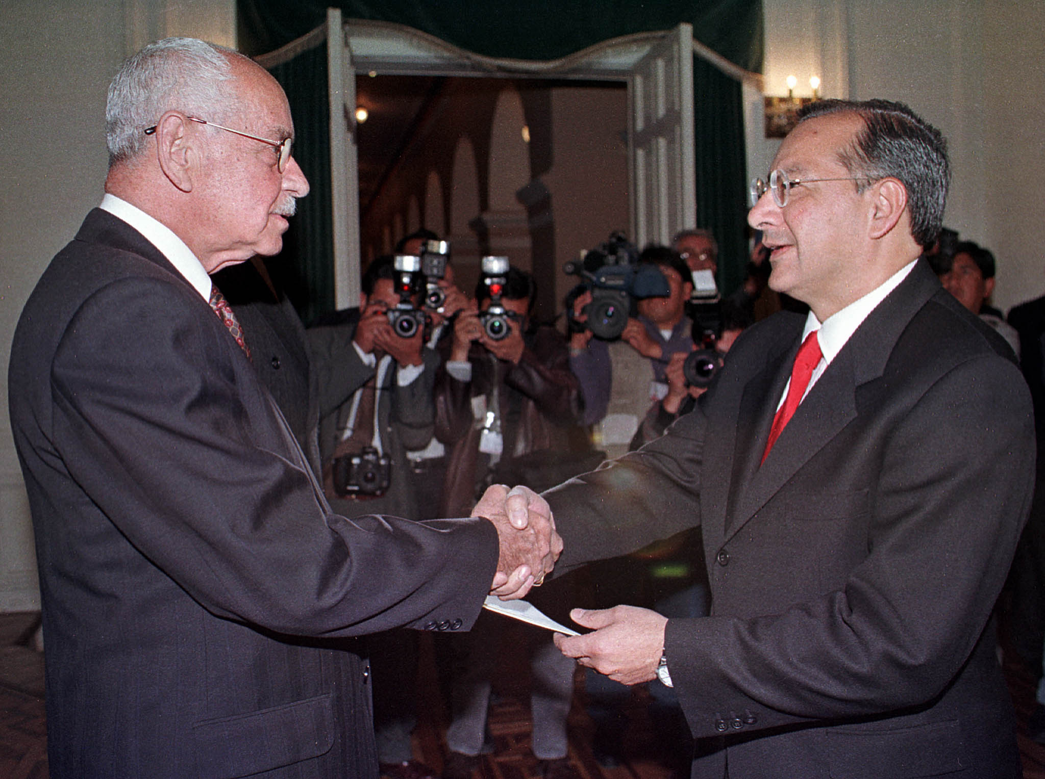 BOLIVIAN PRESIDENT BANZER SHAKES HANDS WITH NEW US AMBASSADOR TO BOLIVIA.