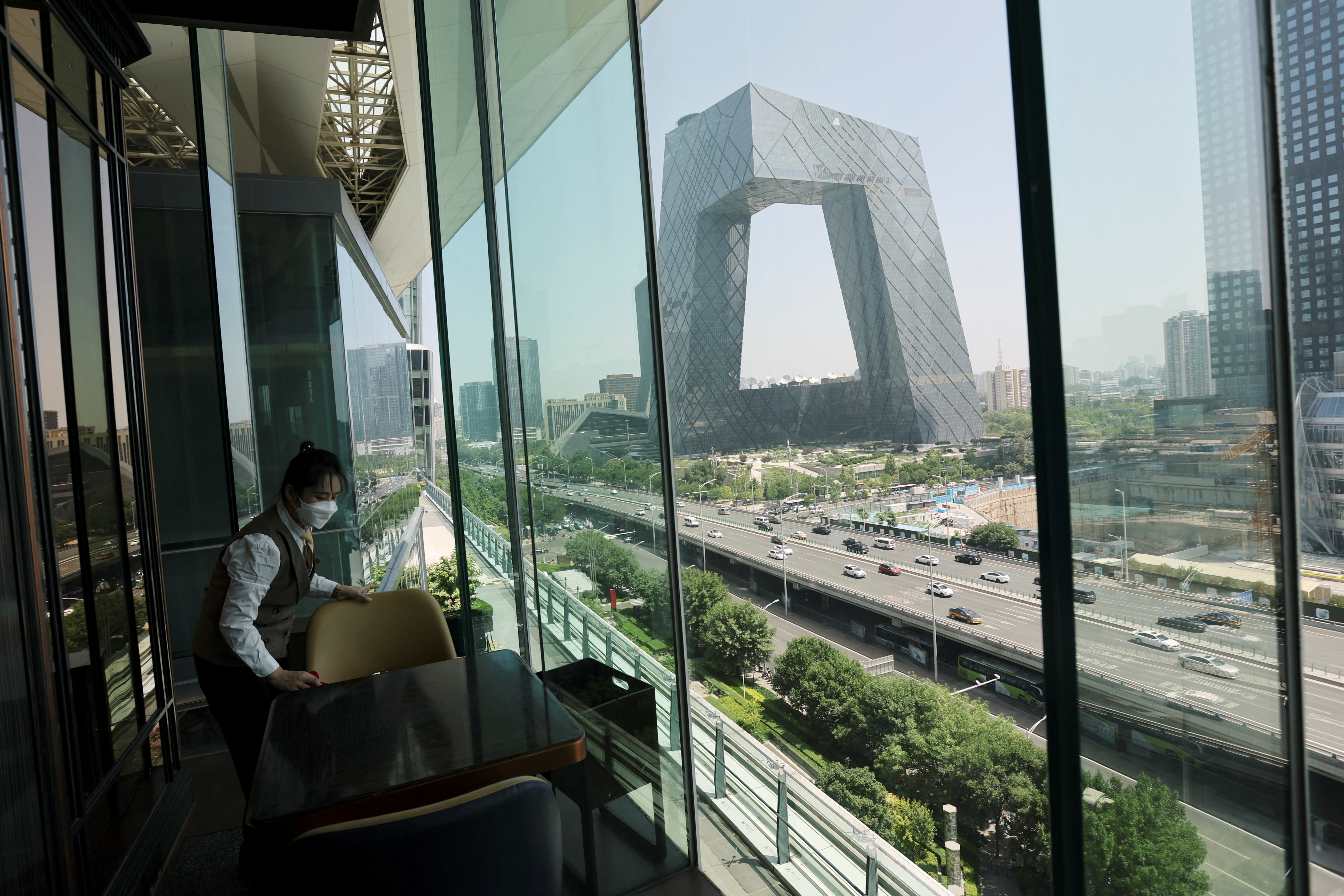 Staff member at a restaurant in Beijing's Central Business District