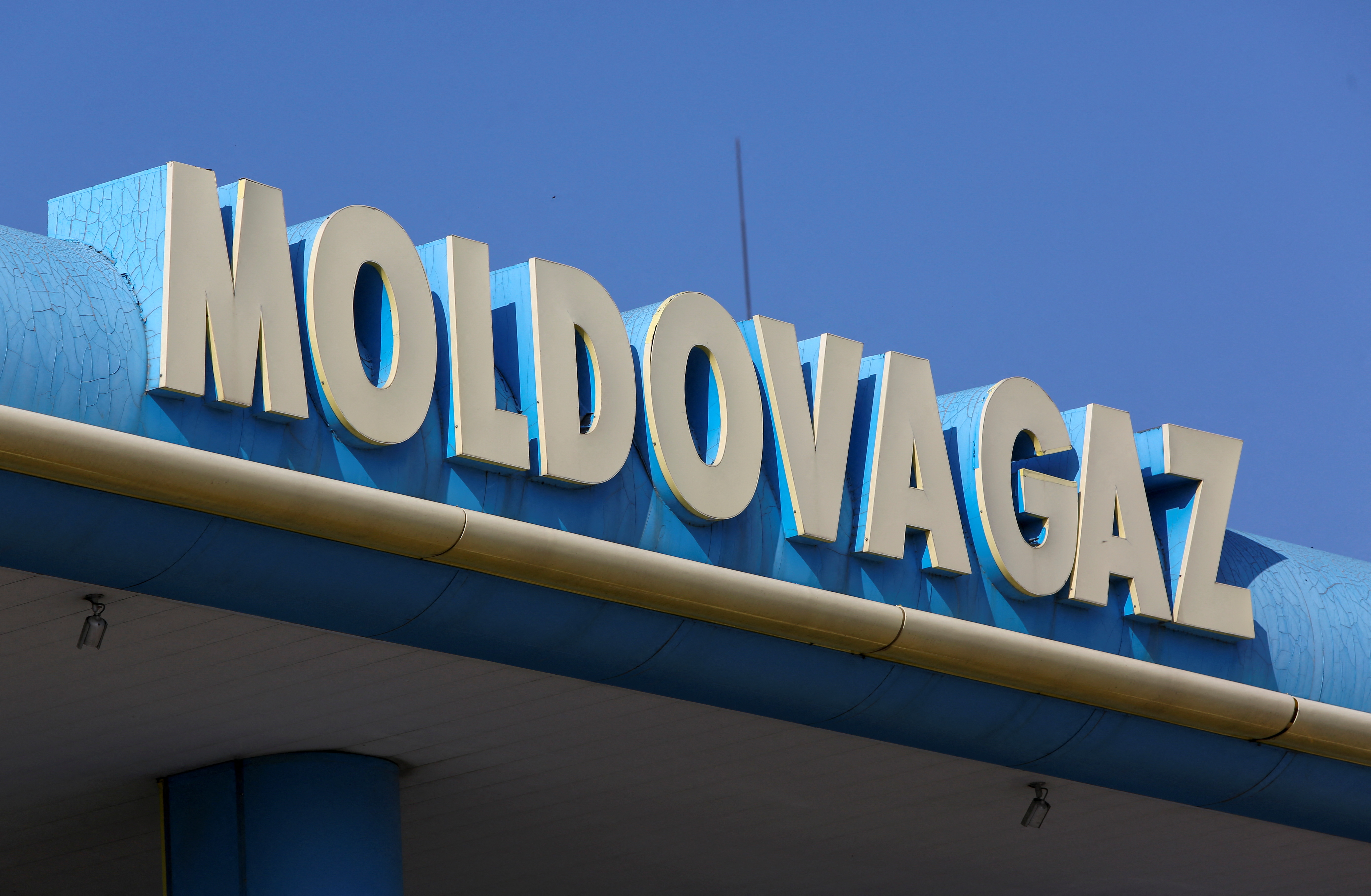 The logo of Moldovagaz energy company is on display in Chisinau