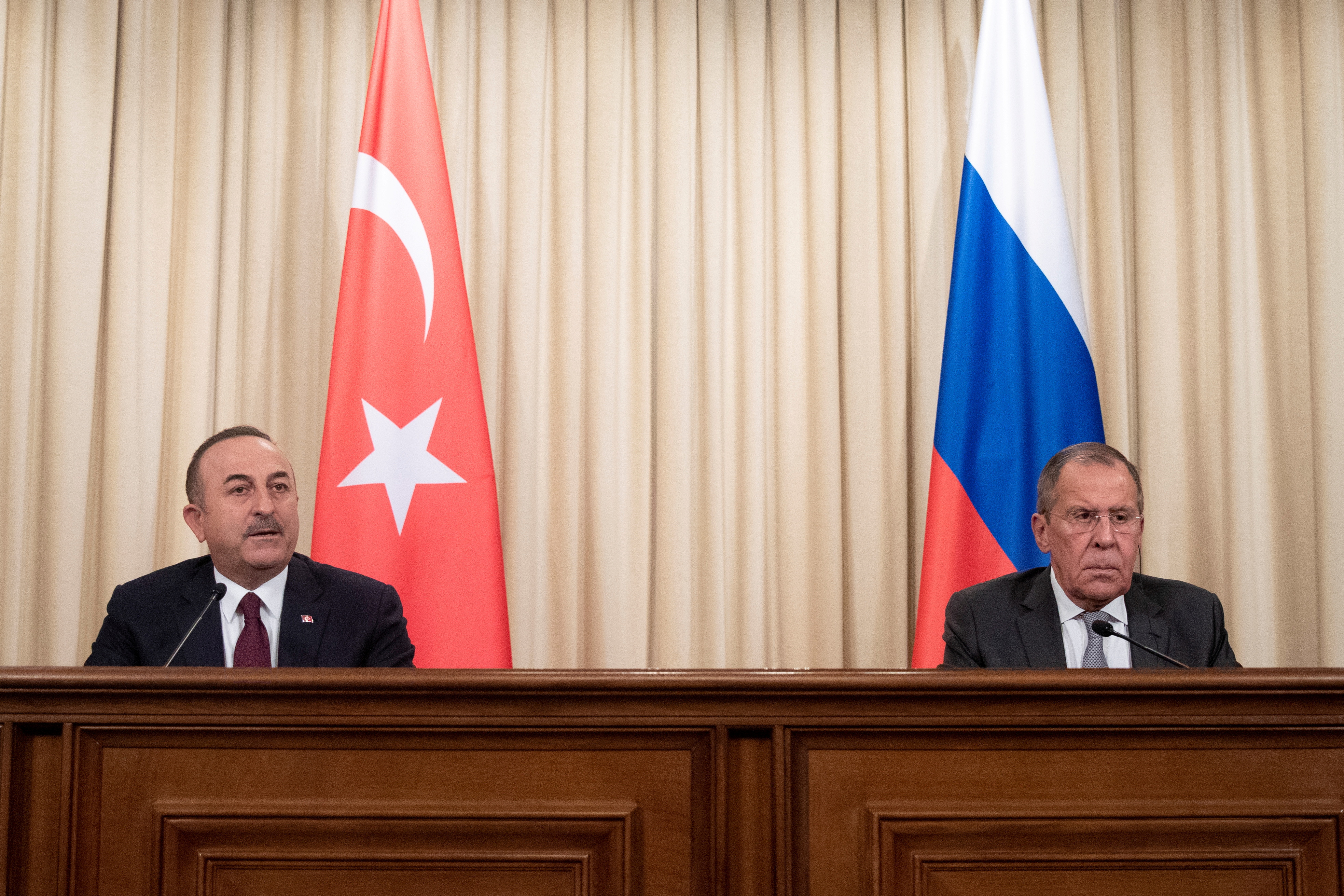 Turkish Foreign Minister Mevlut Cavusoglu and Russian Foreign Minister Sergei Lavrov attend a joint news conference following their talks in Moscow
