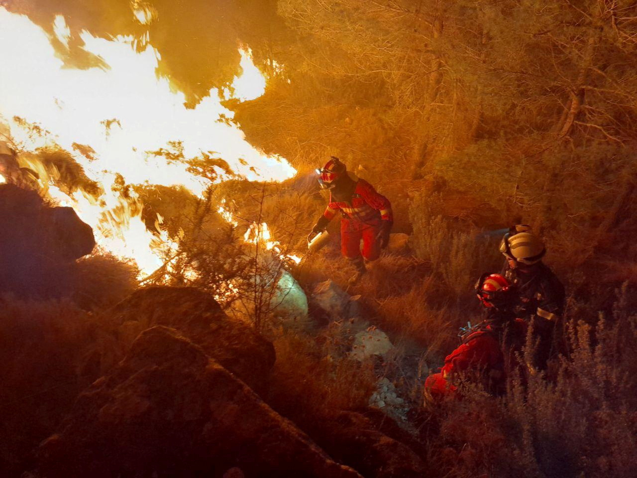 Military firefighters battle wildfire near Montan
