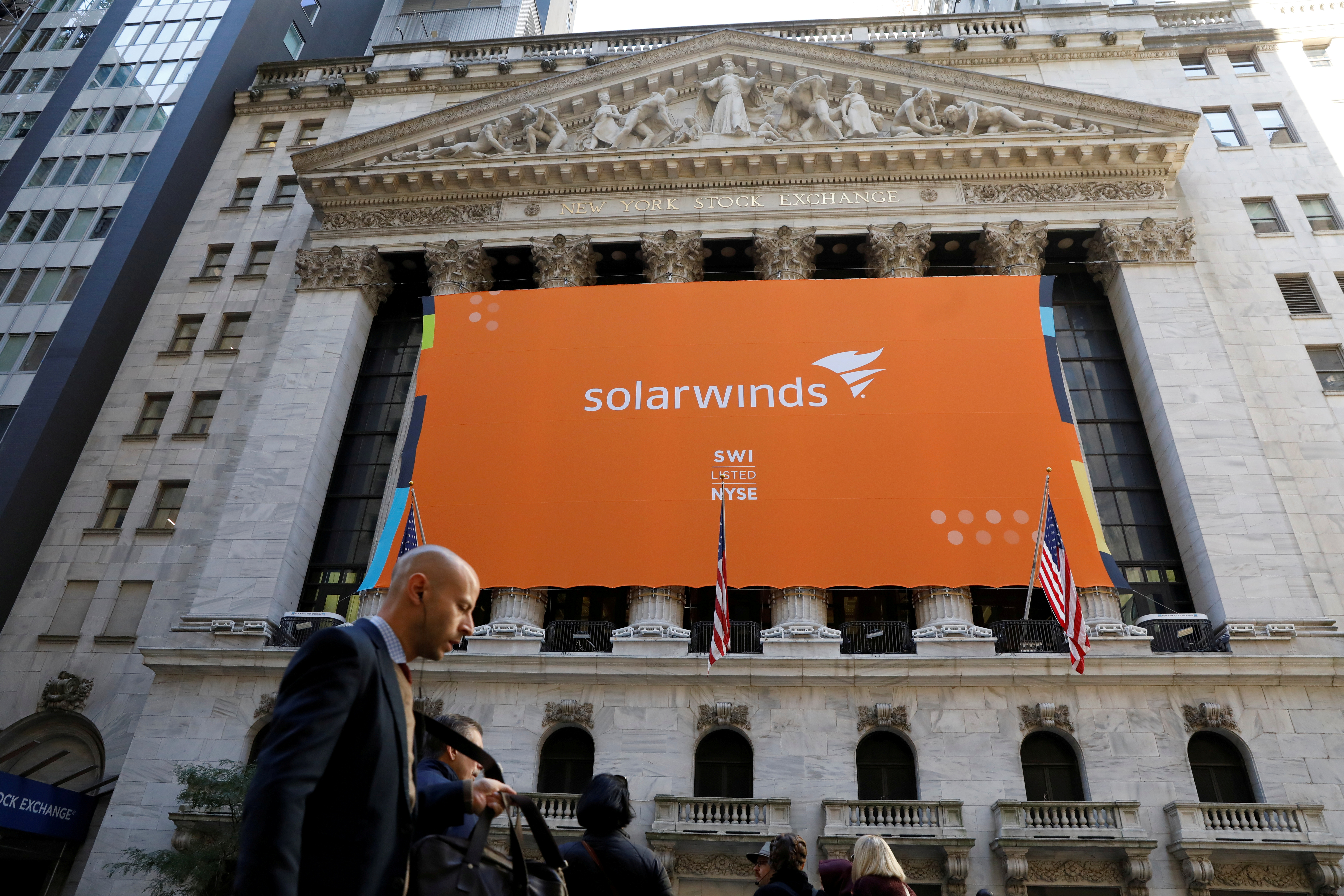 SolarWinds Corp. banner hangs on the company's IPO at the NYSE in New York
