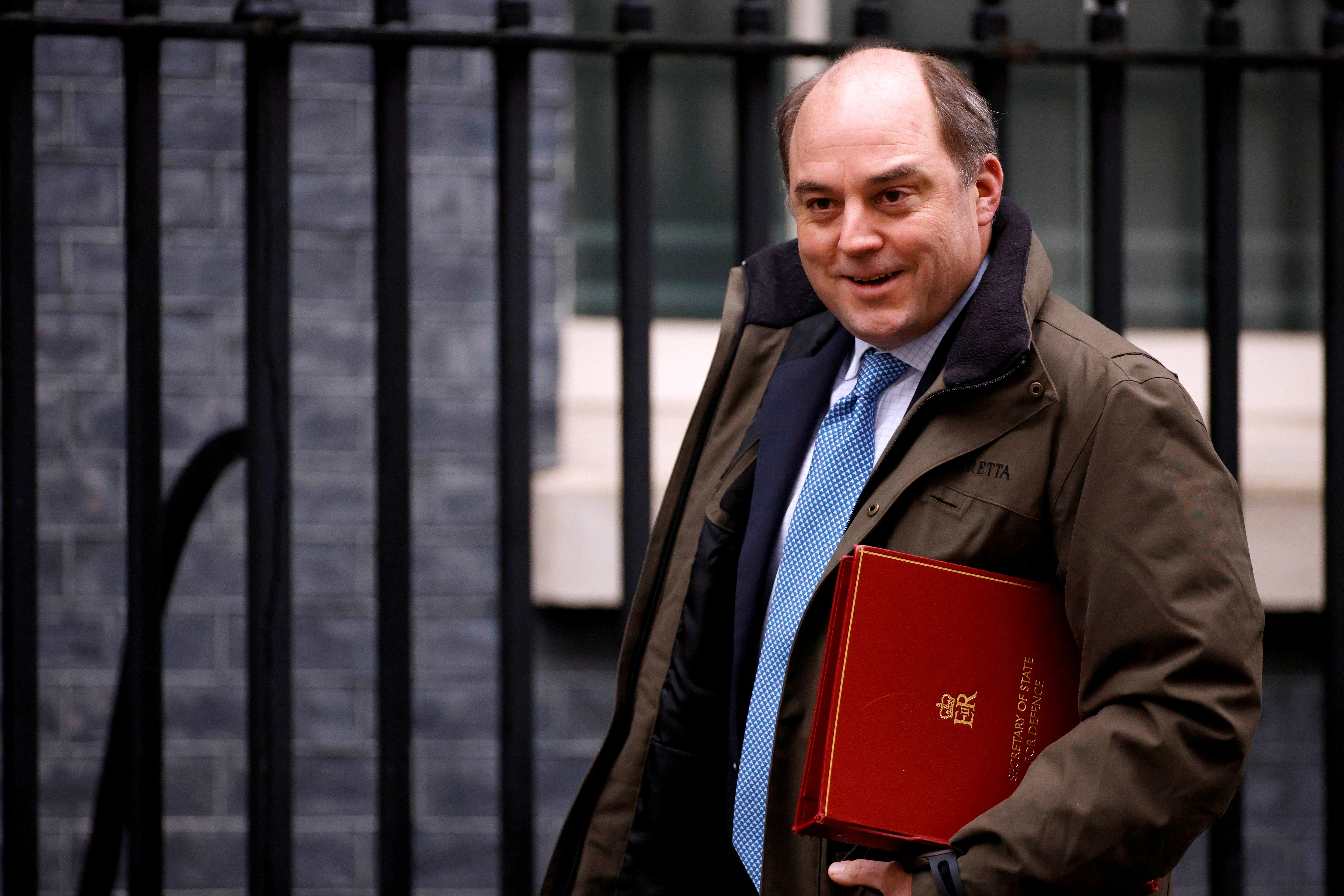 Britain's Defence Secretary Ben Wallace walks outside Downing Street in London