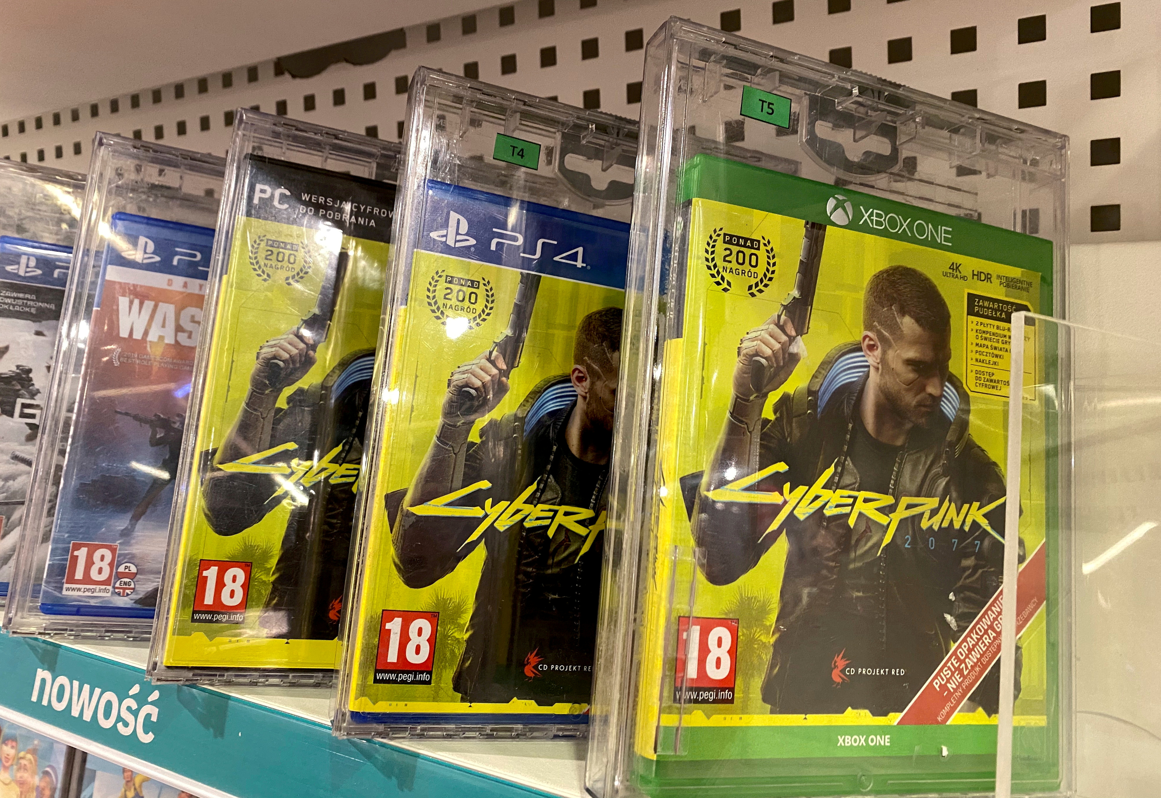 Boxes with CD Projekt's game Cyberpunk 2077 are displayed in Warsaw, Poland