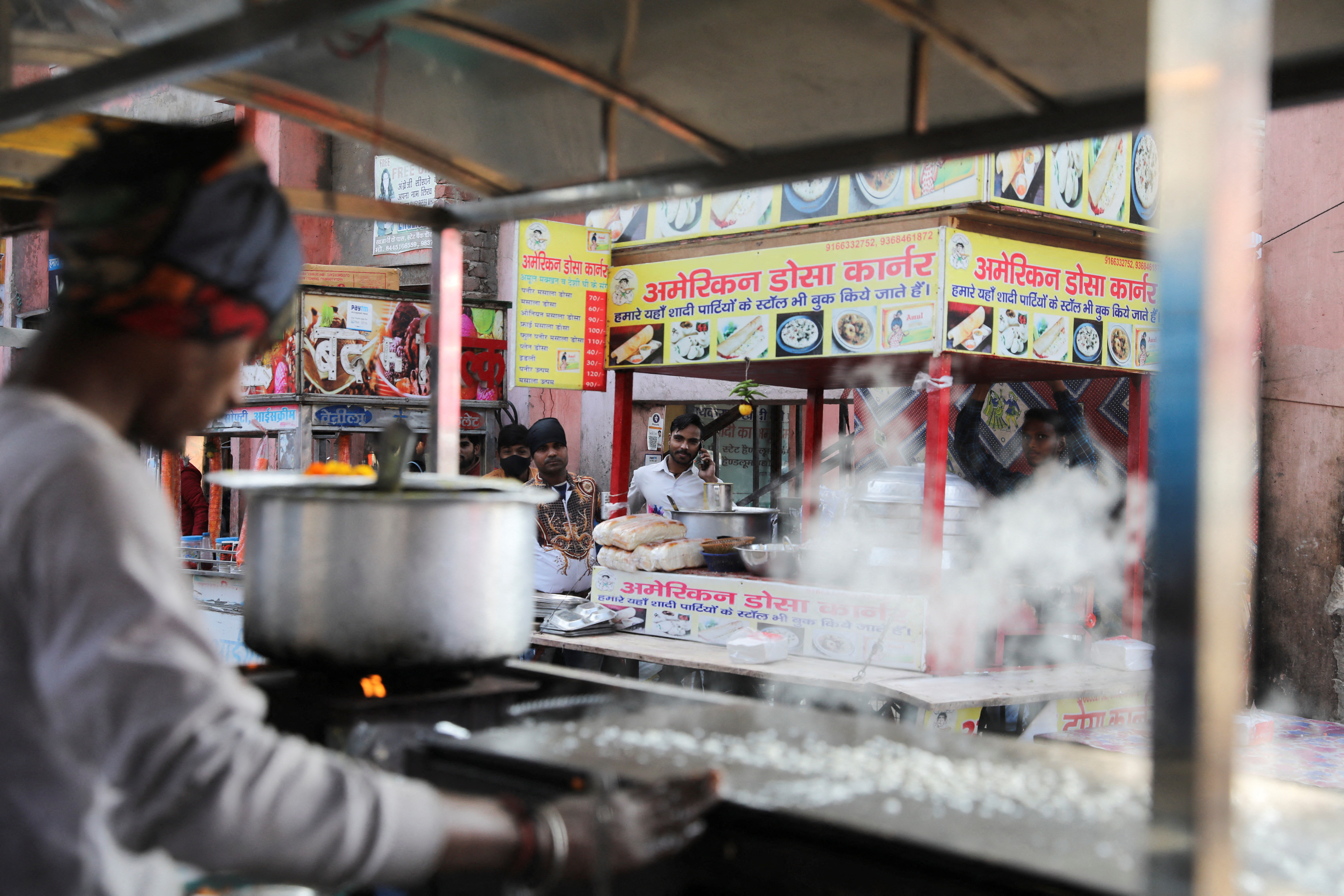 American Dosa Corner, a food cart, is pictured at a market in Mathura town