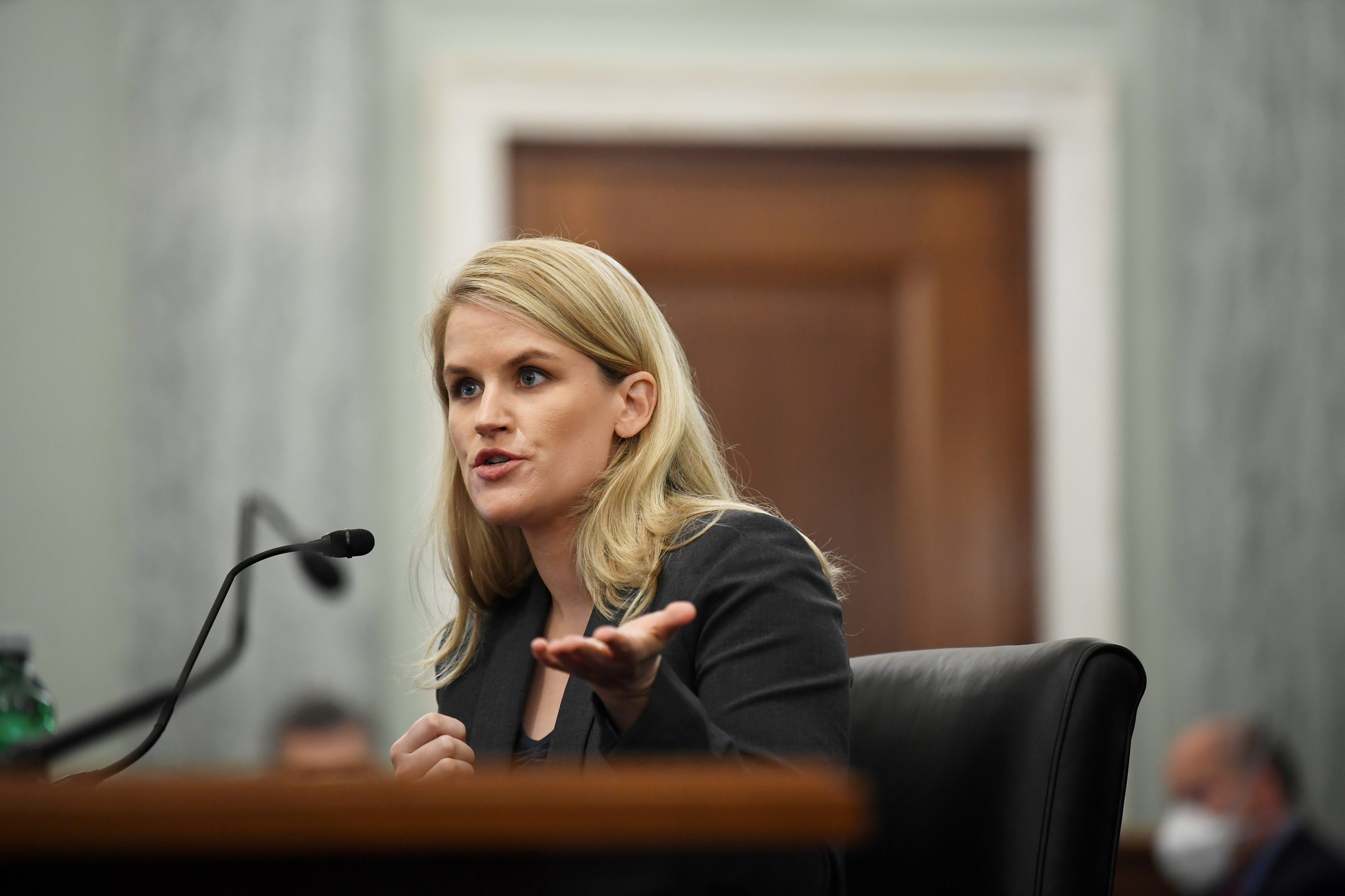 Former Facebook employee and whistleblower Frances Haugen testifies during a Senate Committee on Commerce, Science, and Transportation hearing entitled 'Protecting Kids Online: Testimony from a Facebook Whistleblower' on Capitol Hill, in Washington, U.S., October 5, 2021.  Matt McClain/Pool via REUTERS