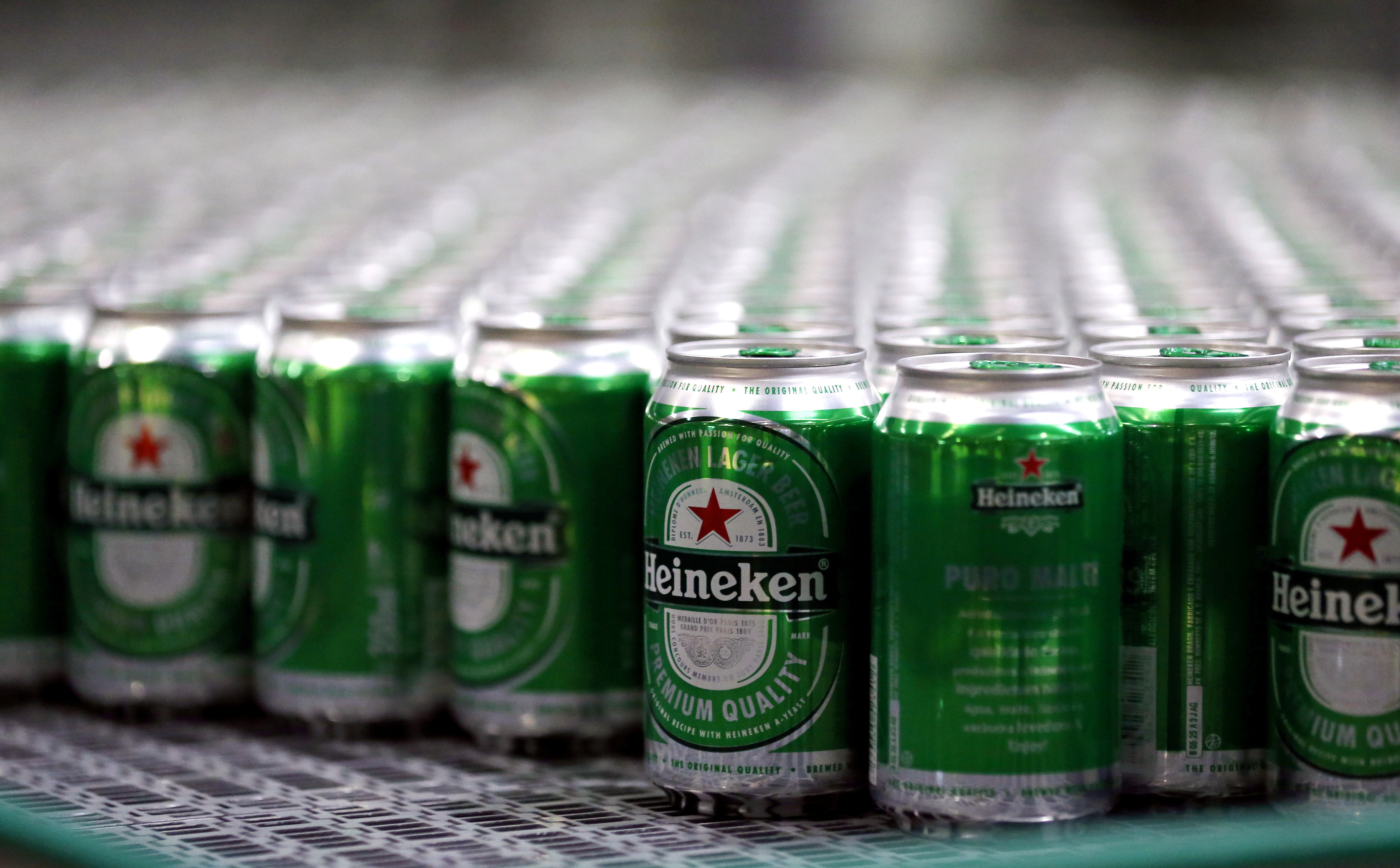Cans of Heineken beer on a brewery production line in Brazil