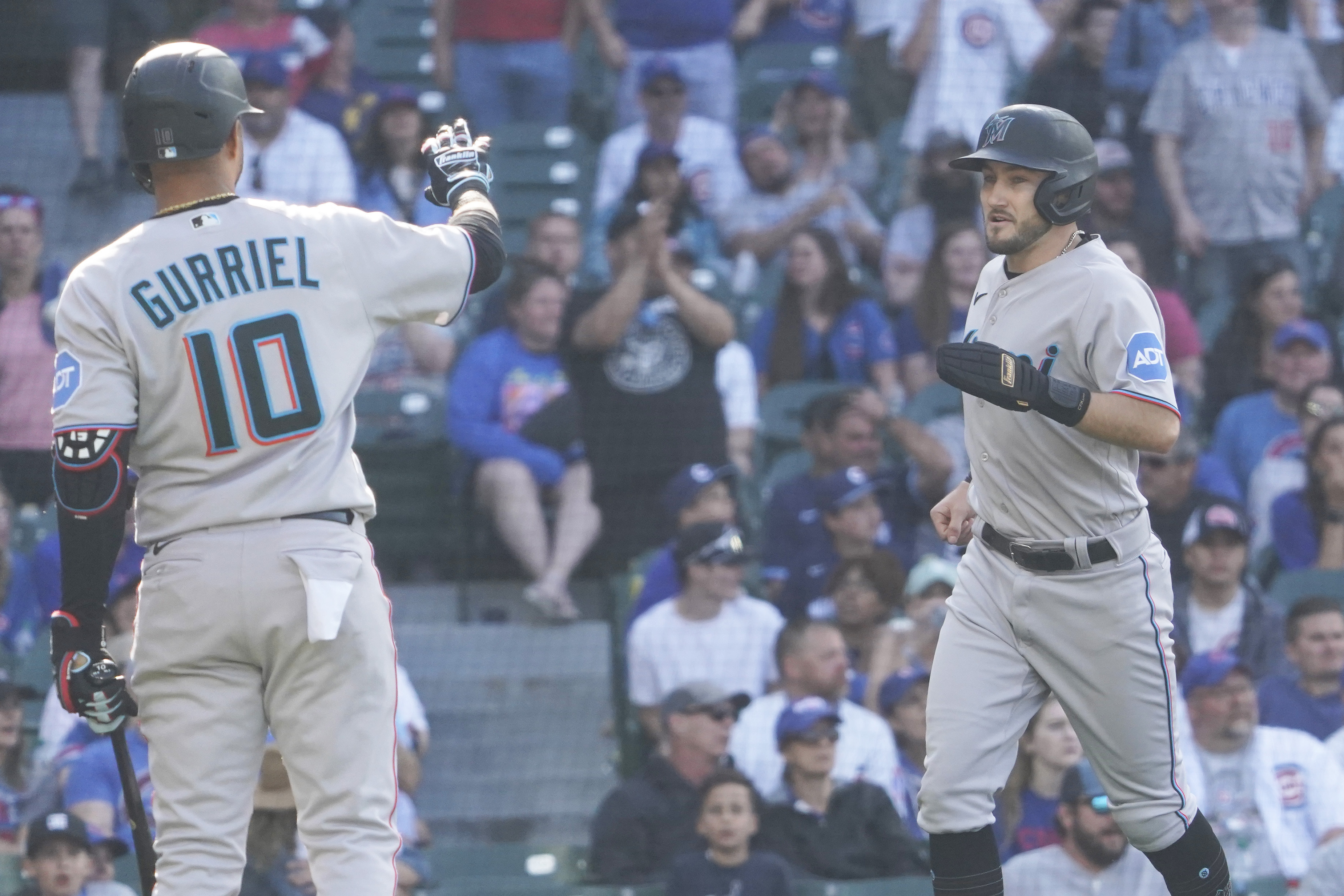 Marlins top Cubs in 14 innings, tie major league record with 11-0