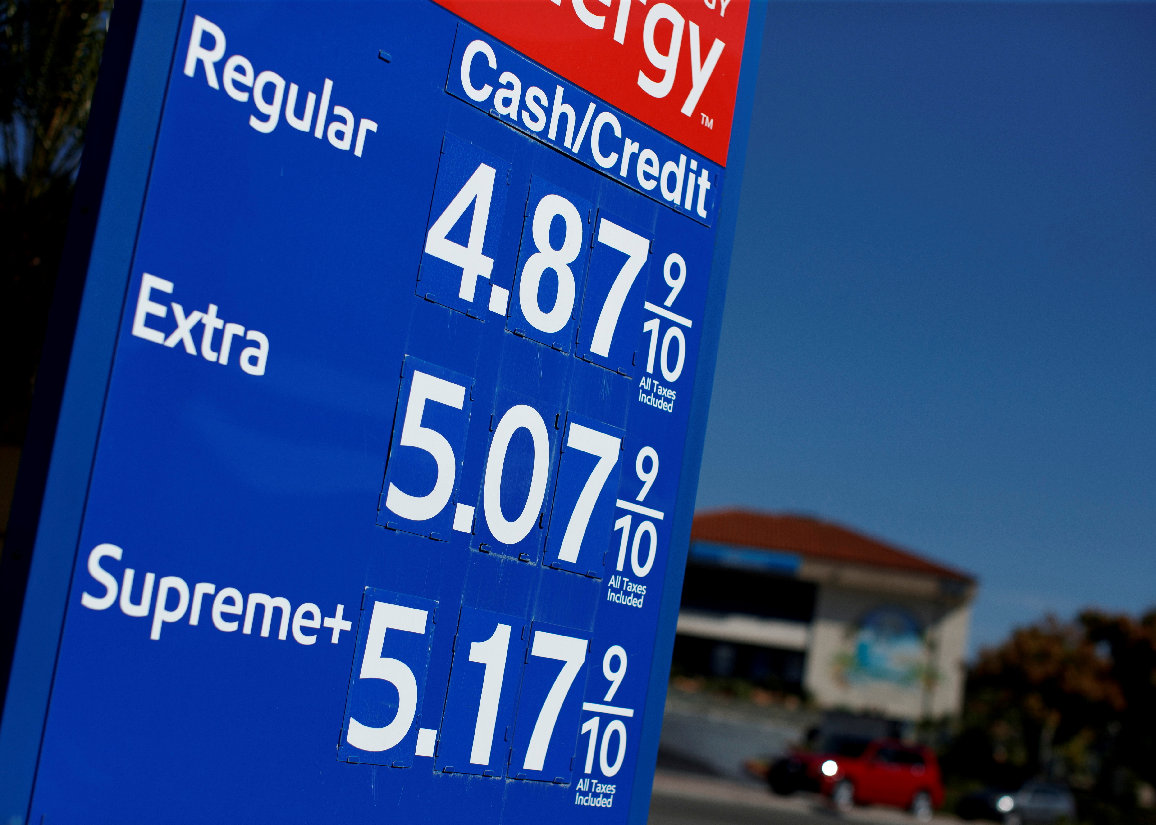 Gas prices grow along with inflation as this sign at a gas station shows in San Diego, California, U.S. November, 9, 2021. REUTERS/Mike Blake/File Photo