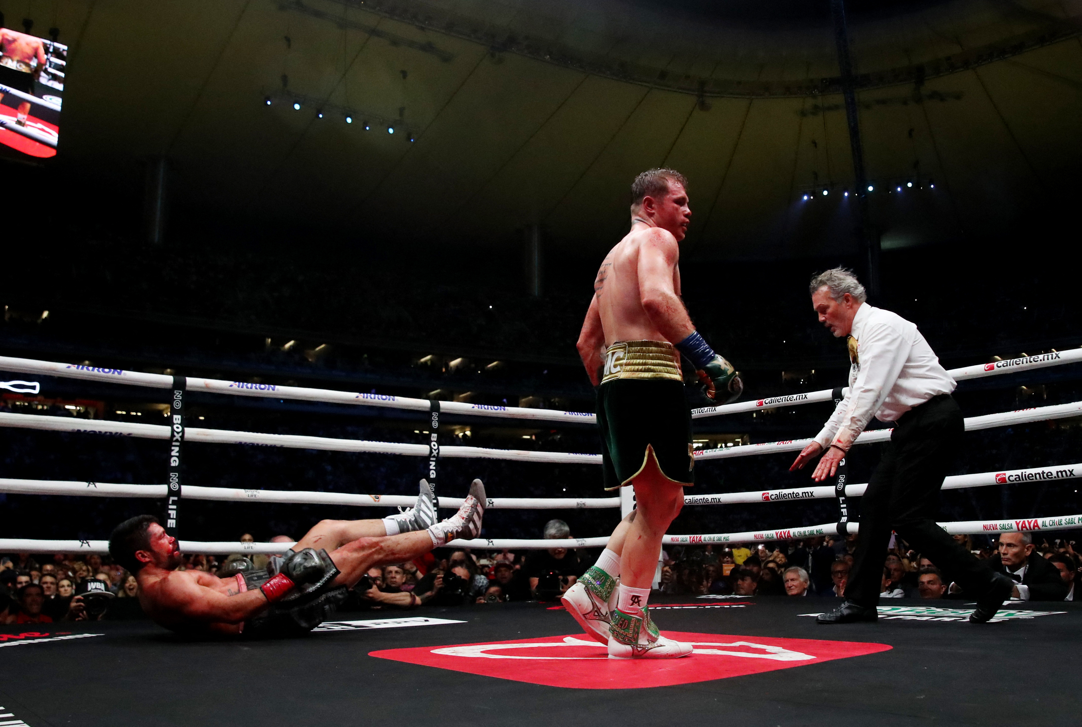 Saul Alvarez batters John Ryder to retain undisputed super middleweight  crown