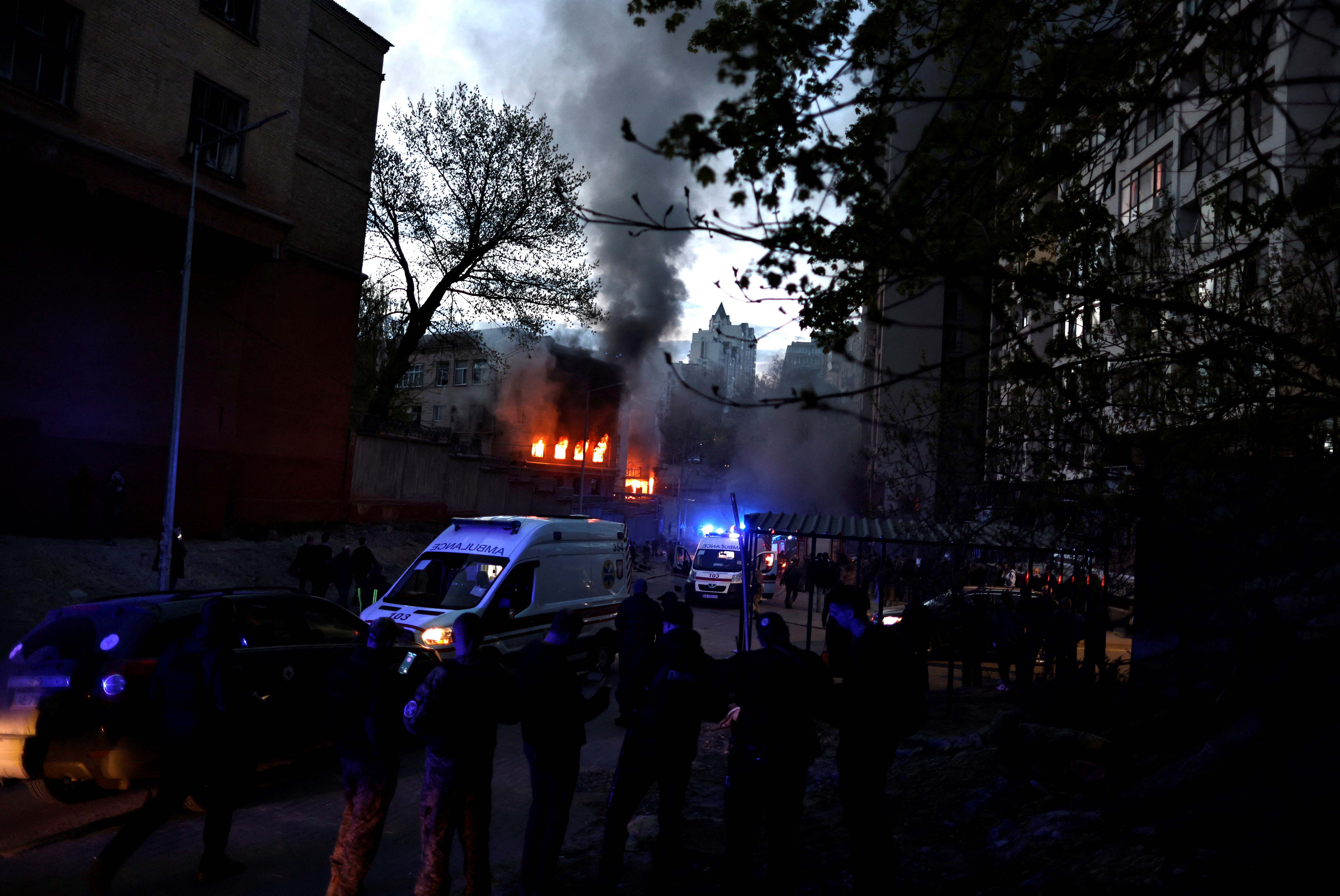 Fire burns in a building after a shelling, amid Russia's invasion of Ukraine, in Kyiv