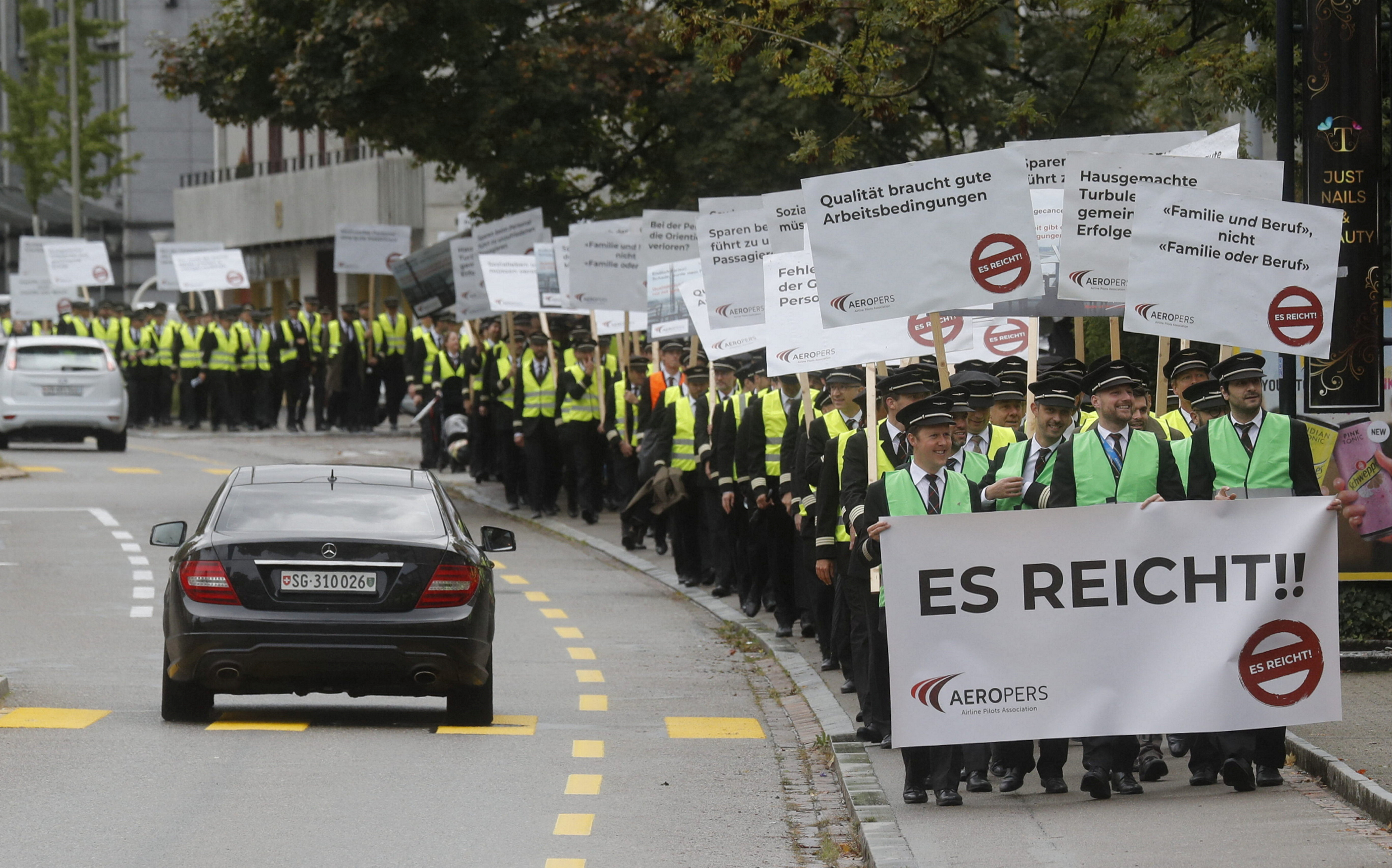 Members of AEROPERS protest in front of the headquarters of Swiss International Air Lines in Kloten
