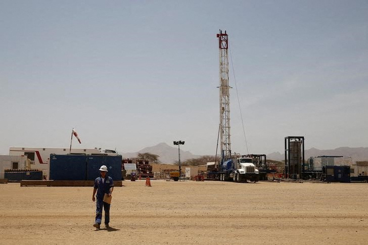 Worker walks at a Tullow Oil explorational drilling site in Lokichar