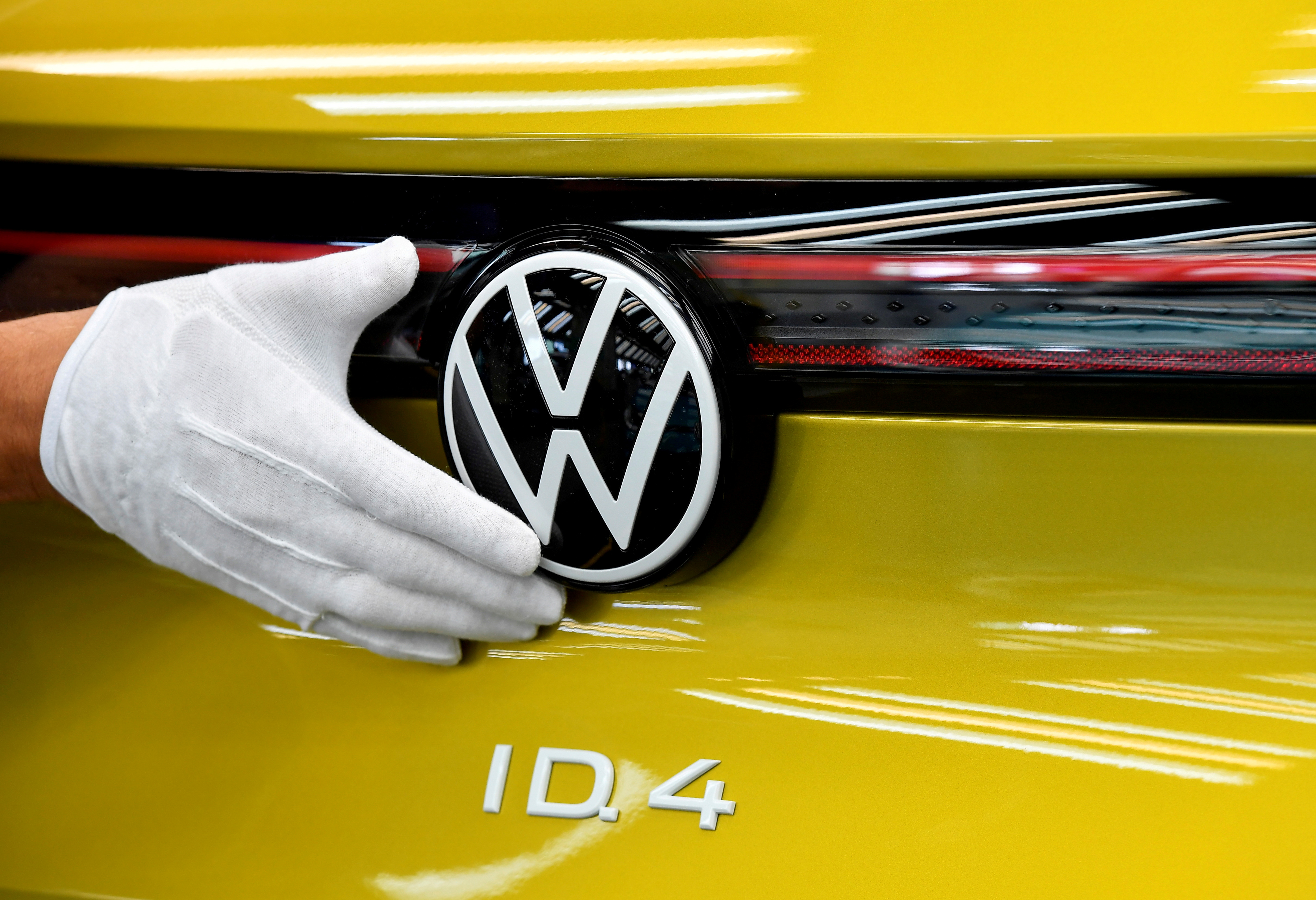 VW shows electric SUV ID 4 during a photo workshop