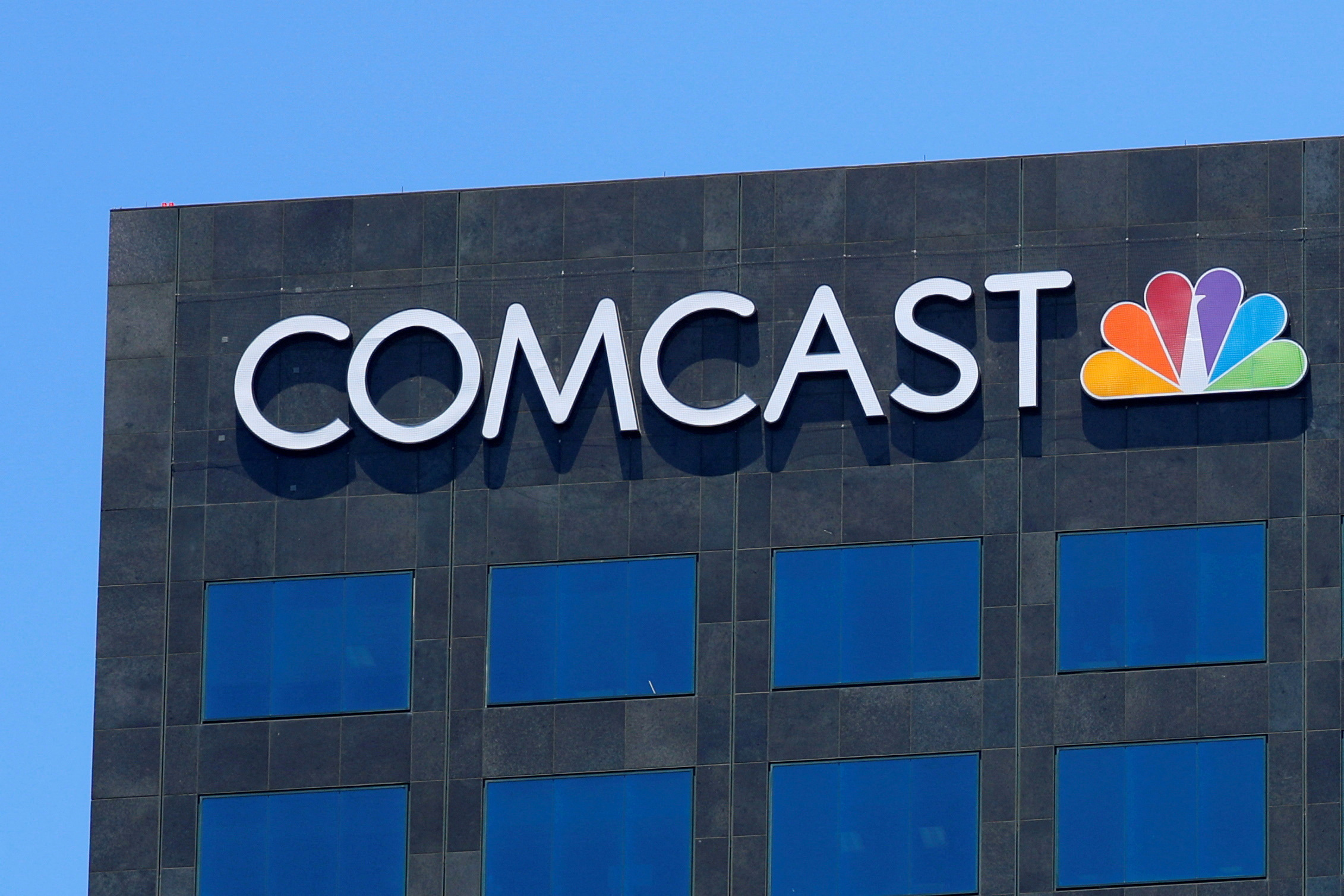 Comcast quarterly revenue beats but broadband, advertising growth muted |  Reuters